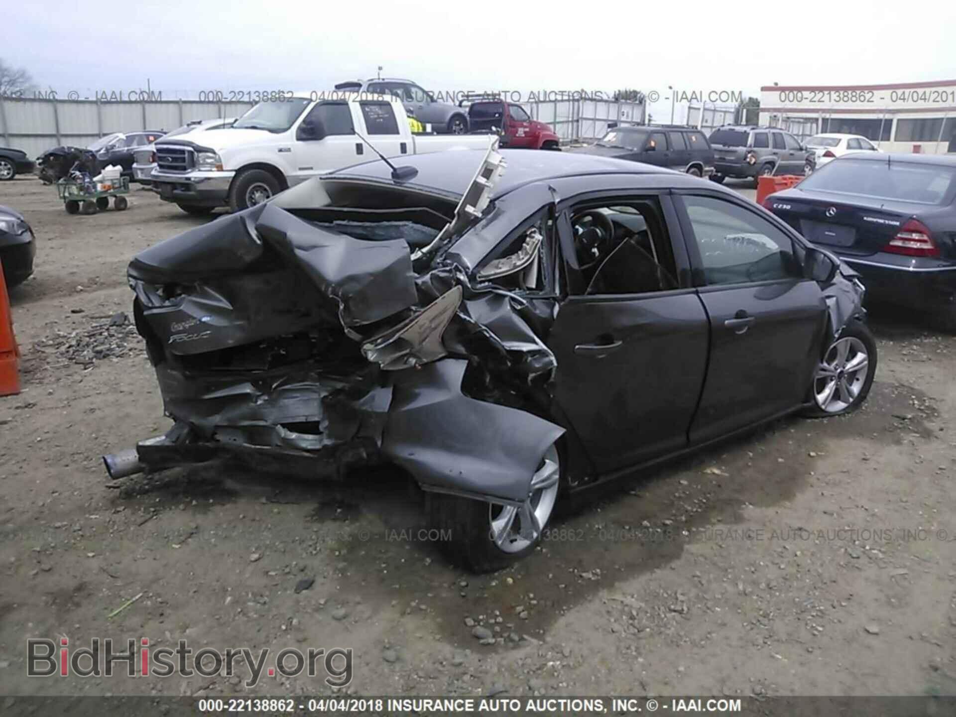 2014 Ford Focus - VIN: 1FADP3F27EL321701 - Photo 4