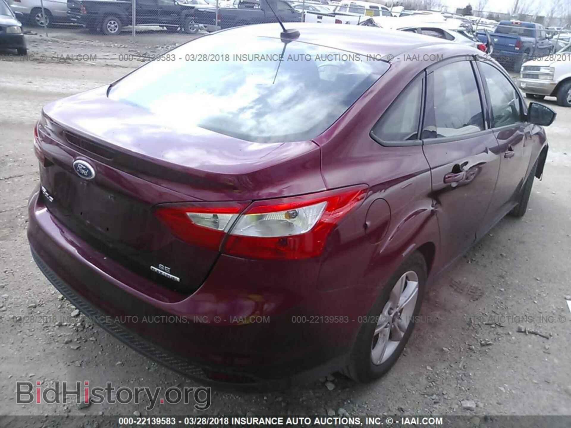 2014 Ford Focus - VIN: 1FADP3F25EL311359 - Фото 4