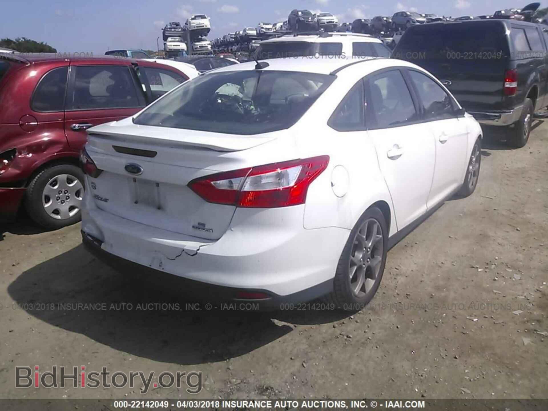 2014 Ford Focus - VIN: 1FADP3F20EL296513 - Фото 4