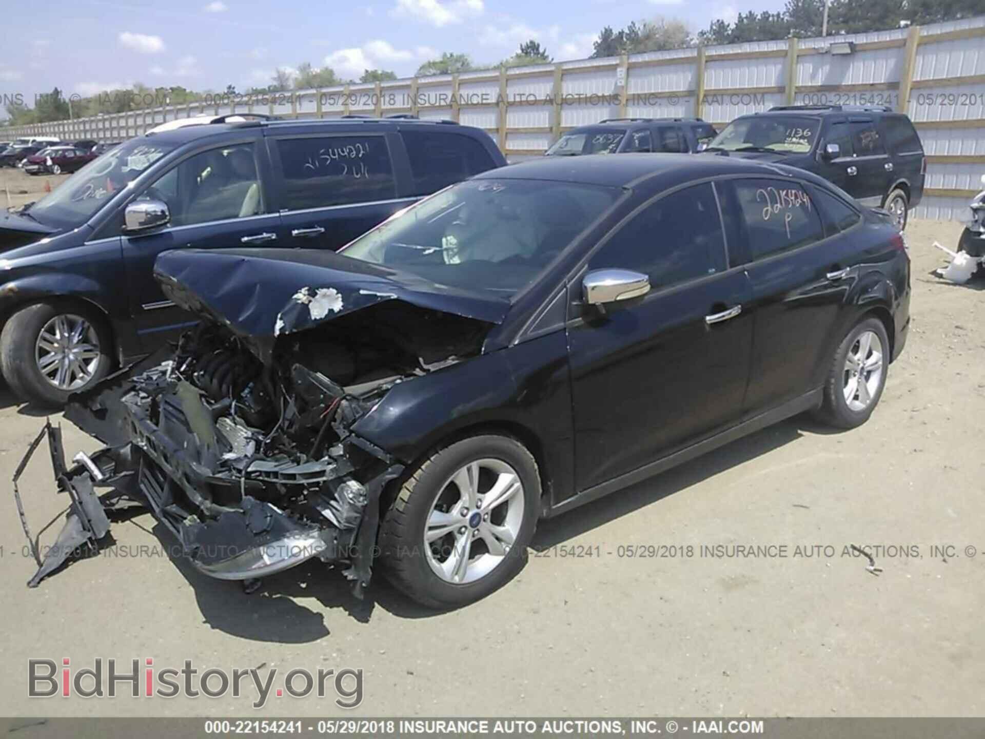 2014 Ford Focus - VIN: 1FADP3F21EL207788 - Photo 2