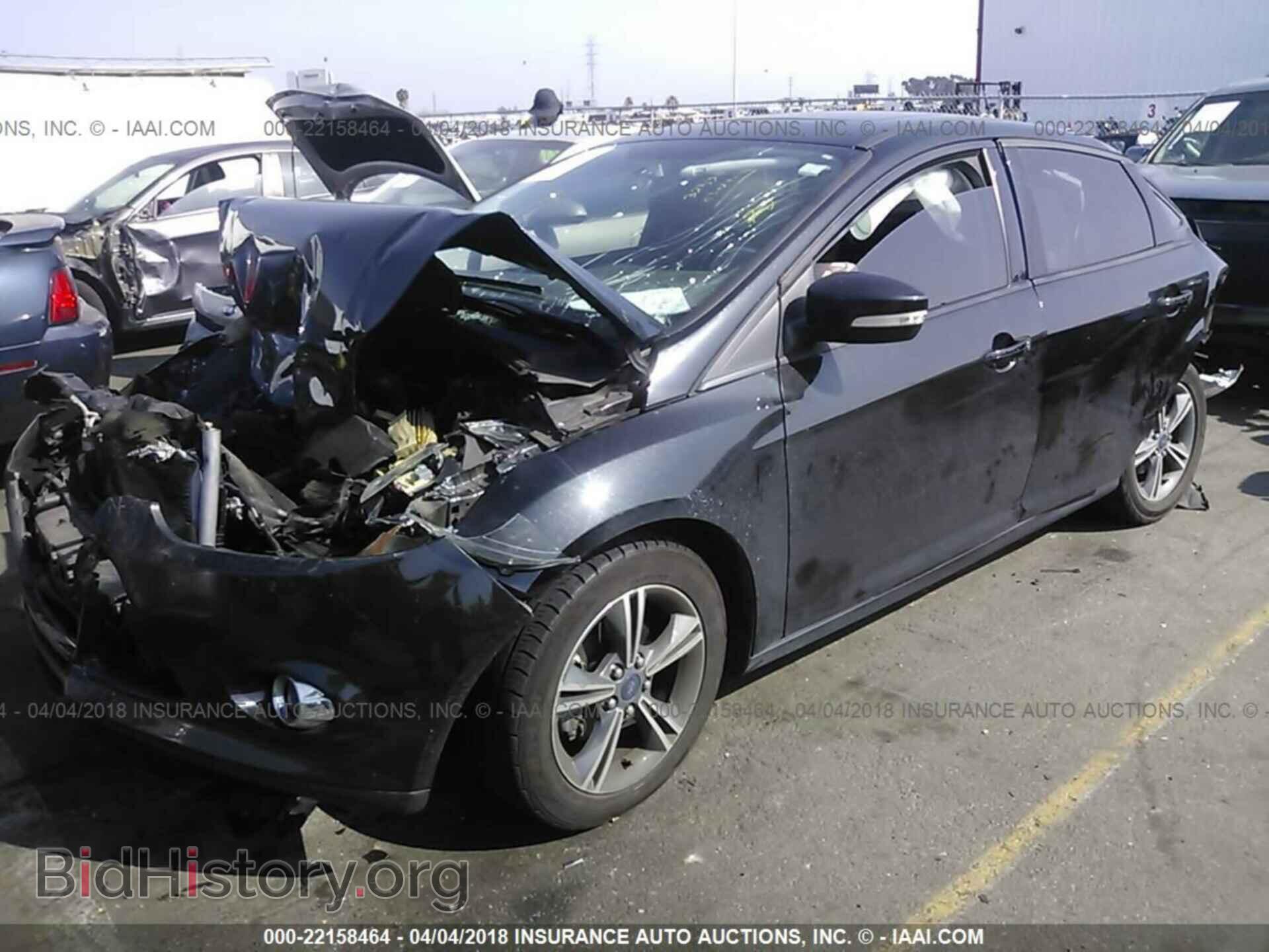2014 Ford Focus - VIN: 1FADP3F21EL341331 - Фото 2