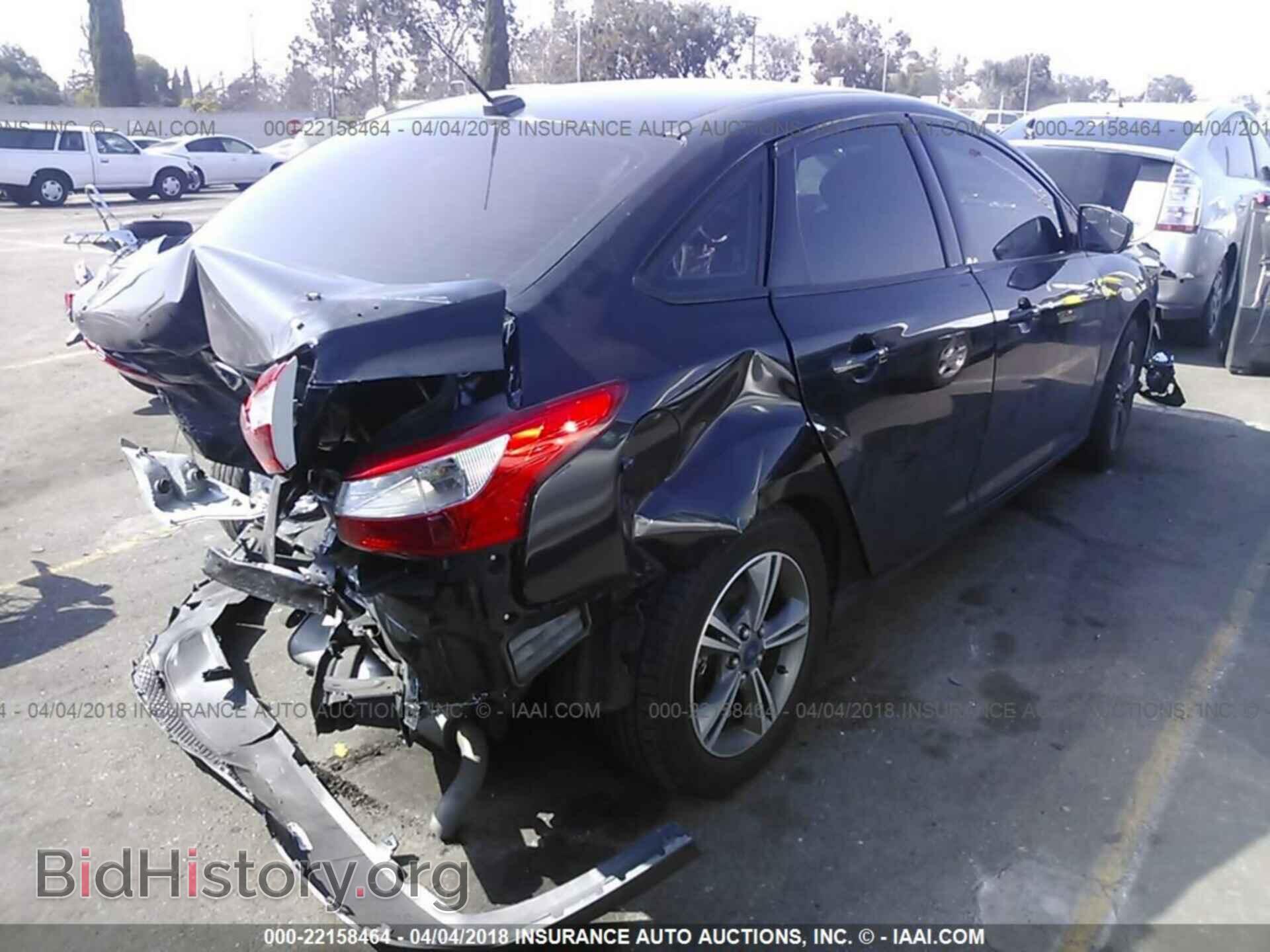 2014 Ford Focus - VIN: 1FADP3F21EL341331 - Фото 4