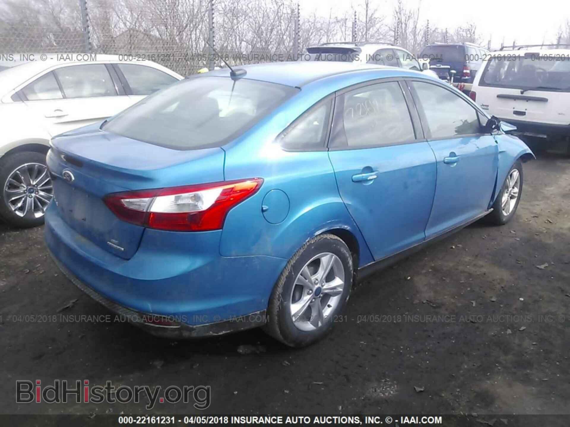2014 Ford Focus - VIN: 1FADP3F25EL105149 - Фото 4