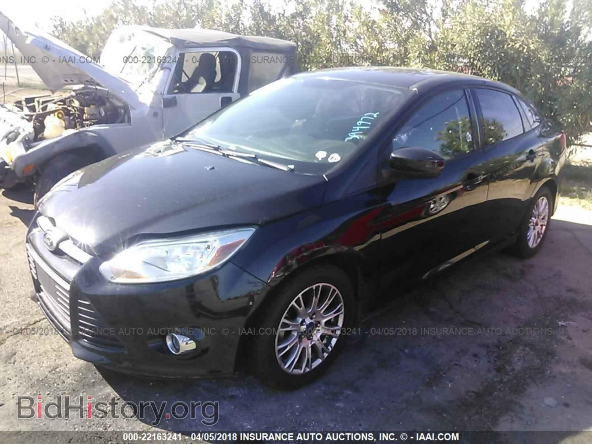 2012 Ford Focus - VIN: 1FAHP3F29CL394972 - Photo 2
