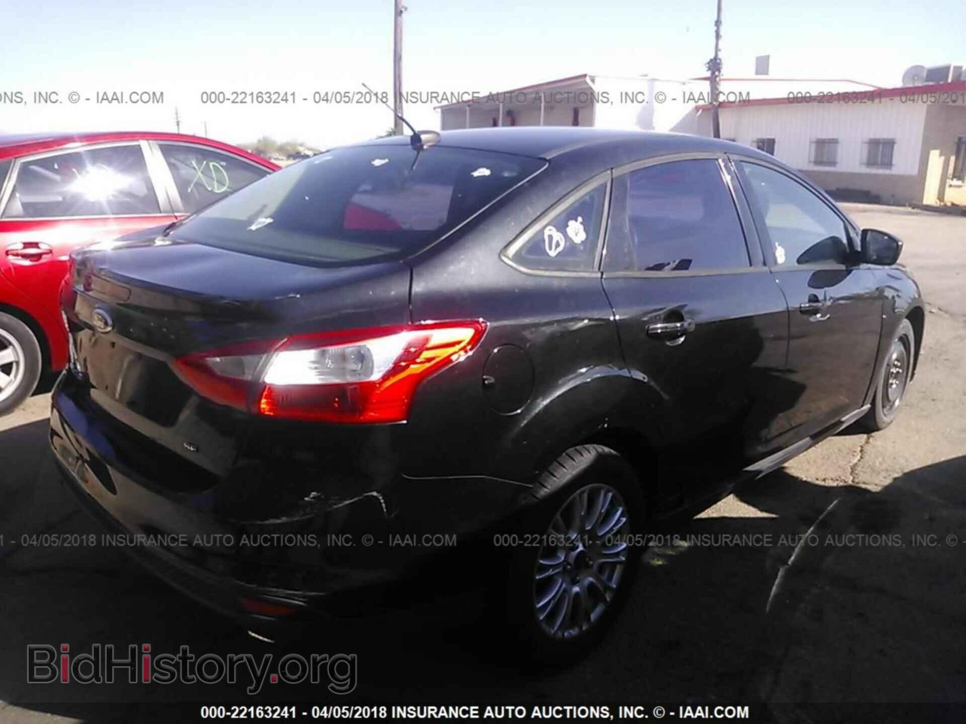 2012 Ford Focus - VIN: 1FAHP3F29CL394972 - Photo 4
