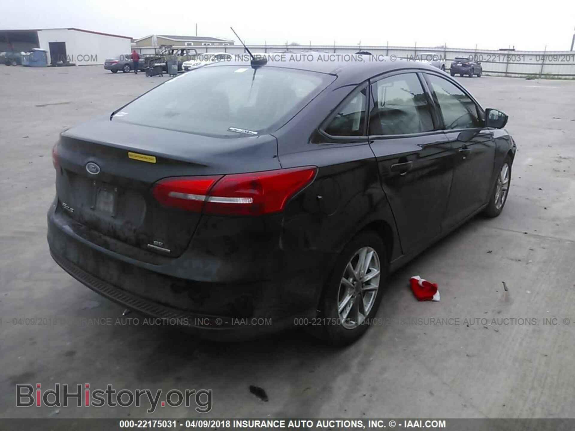 2015 Ford Focus - VIN: 1FADP3F25FL244943 - Photo 4