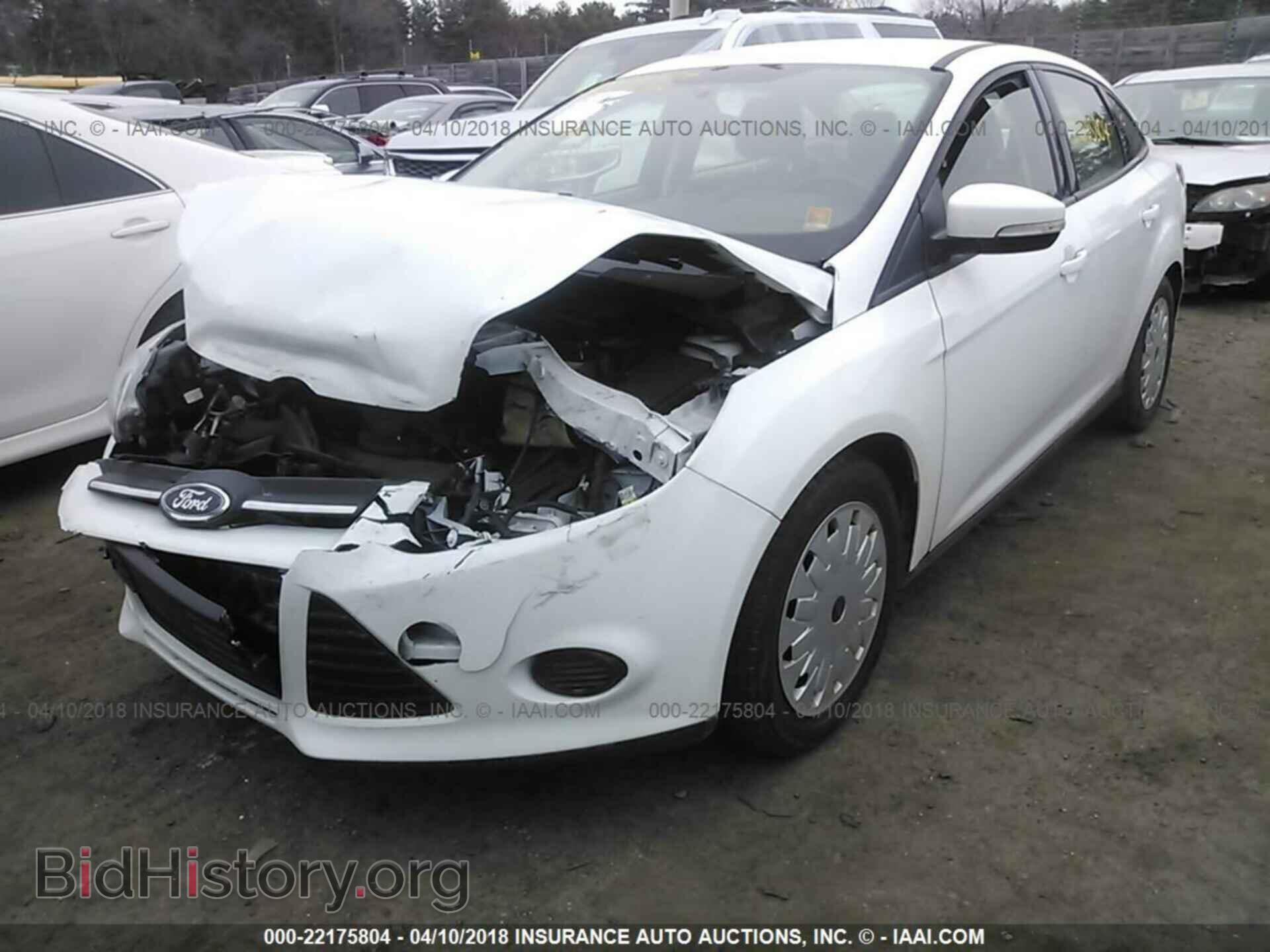 2014 Ford Focus - VIN: 1FADP3F21EL243089 - Photo 2