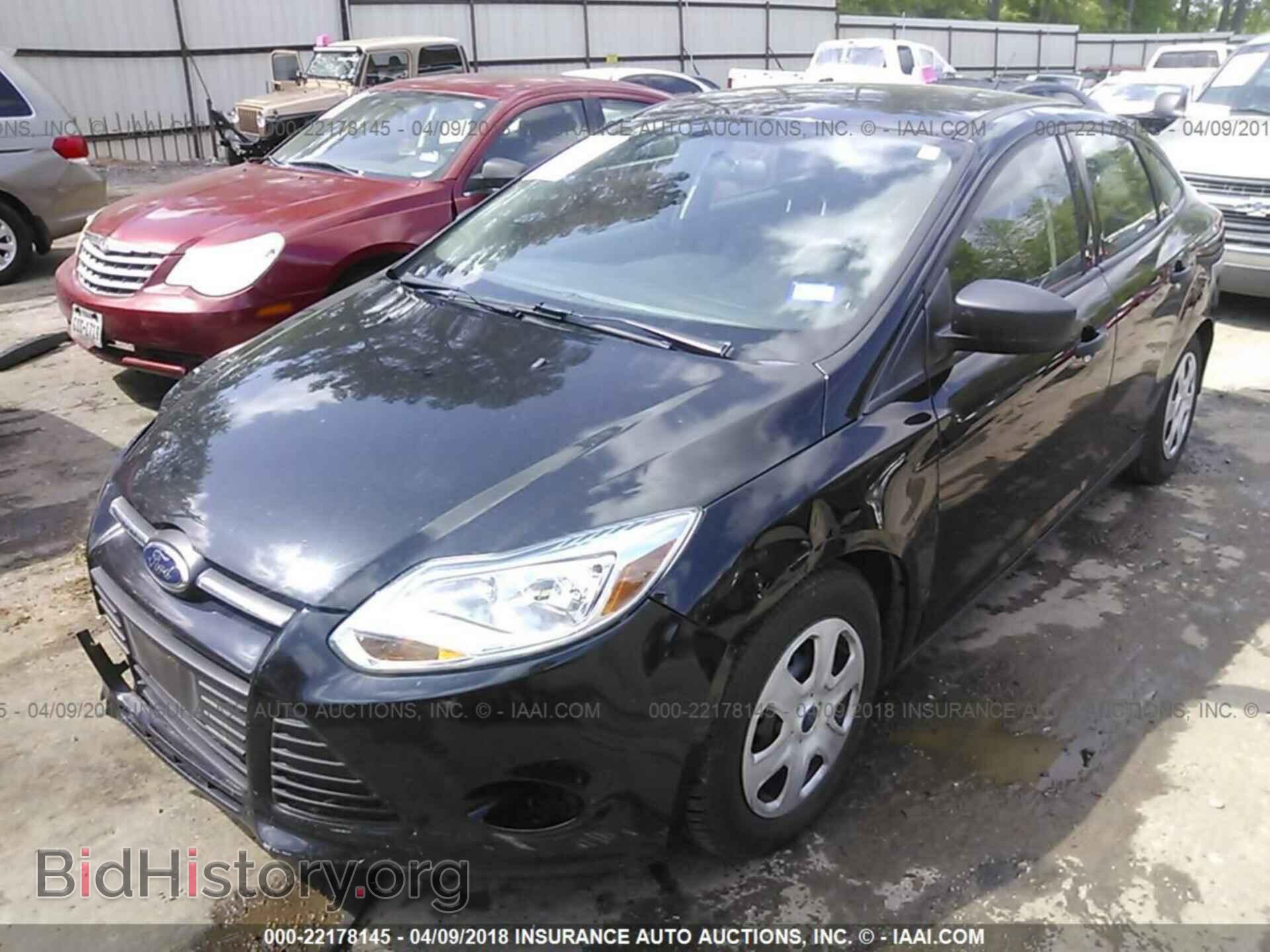 2014 Ford Focus - VIN: 1FADP3E23EL381296 - Фото 2