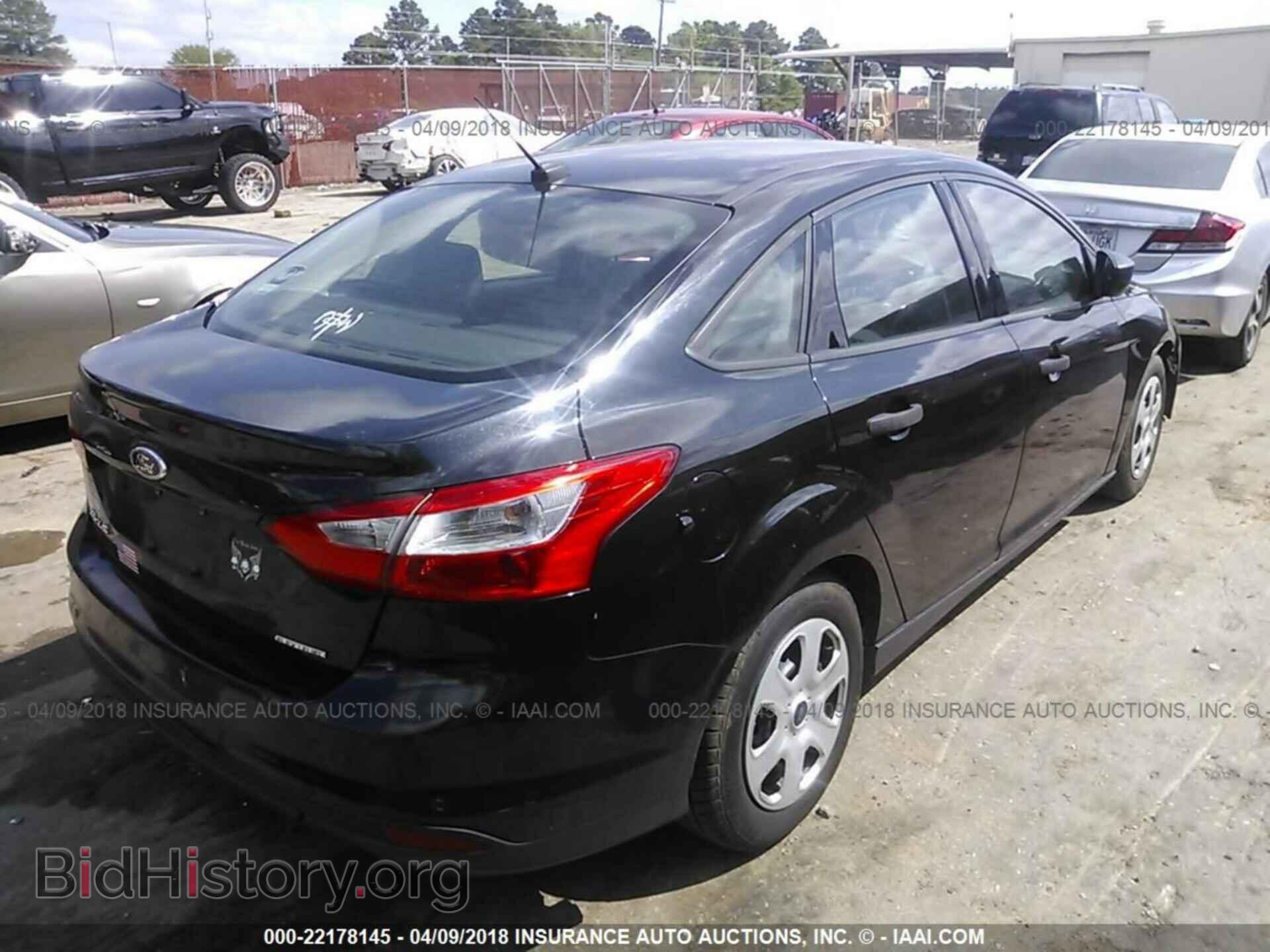 2014 Ford Focus - VIN: 1FADP3E23EL381296 - Фото 4