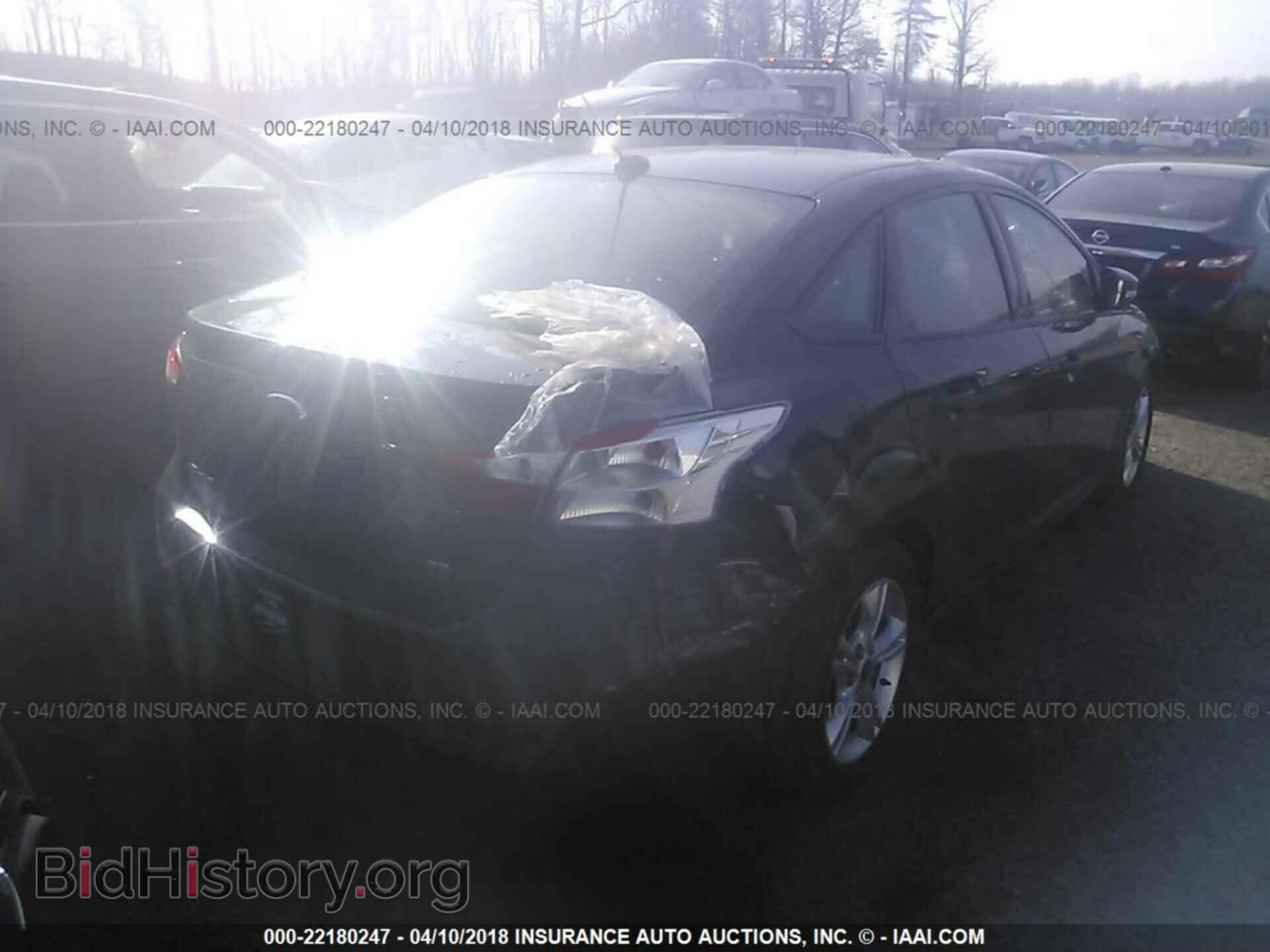 2014 Ford Focus - VIN: 1FADP3F27EL258082 - Фото 4