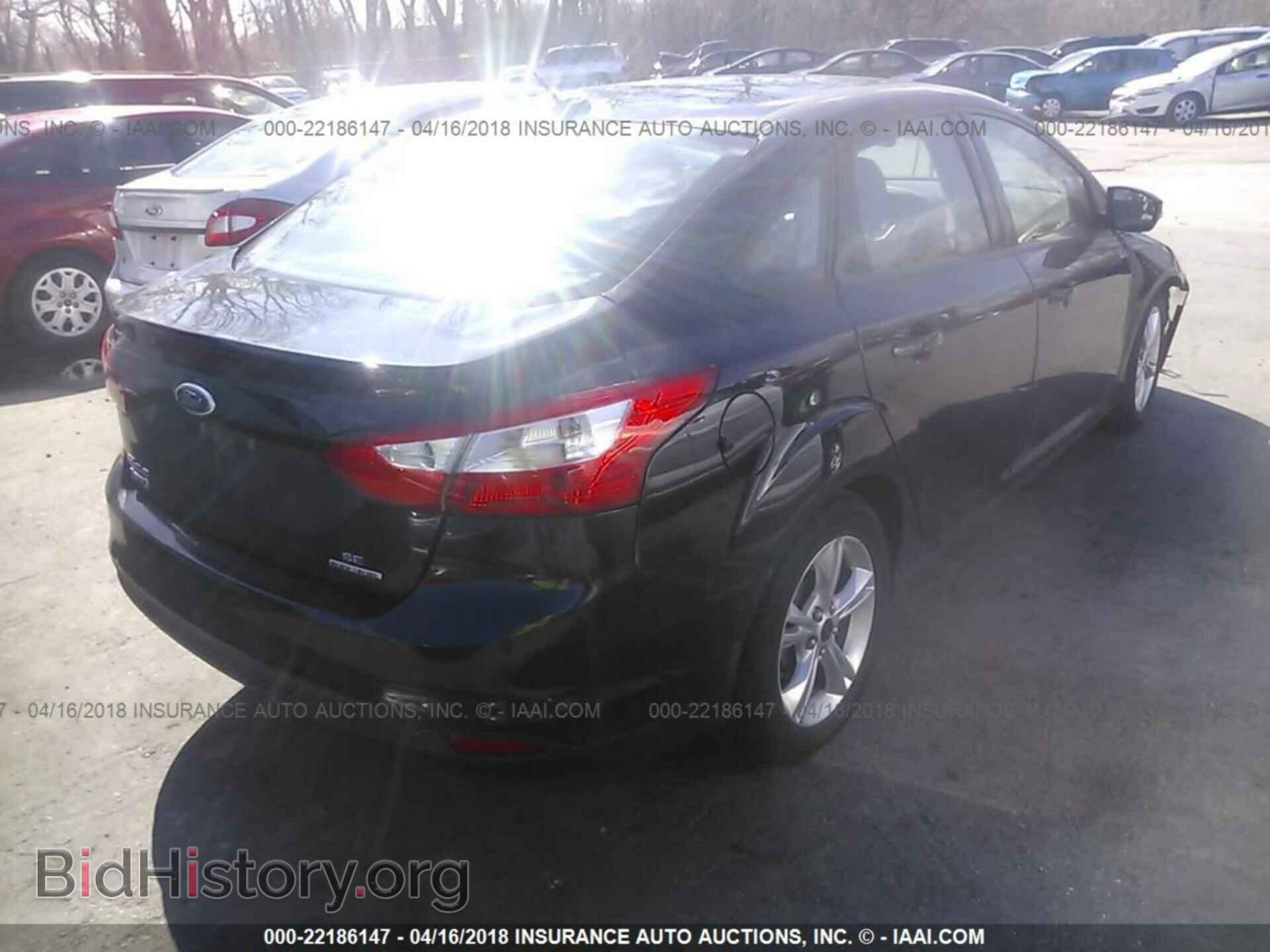 2014 Ford Focus - VIN: 1FADP3F21EL175702 - Photo 4