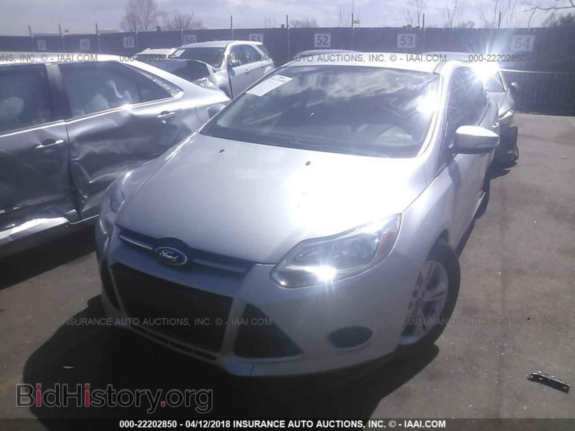 2014 Ford Focus - VIN: 1FADP3F20EL184519 - Фото 2