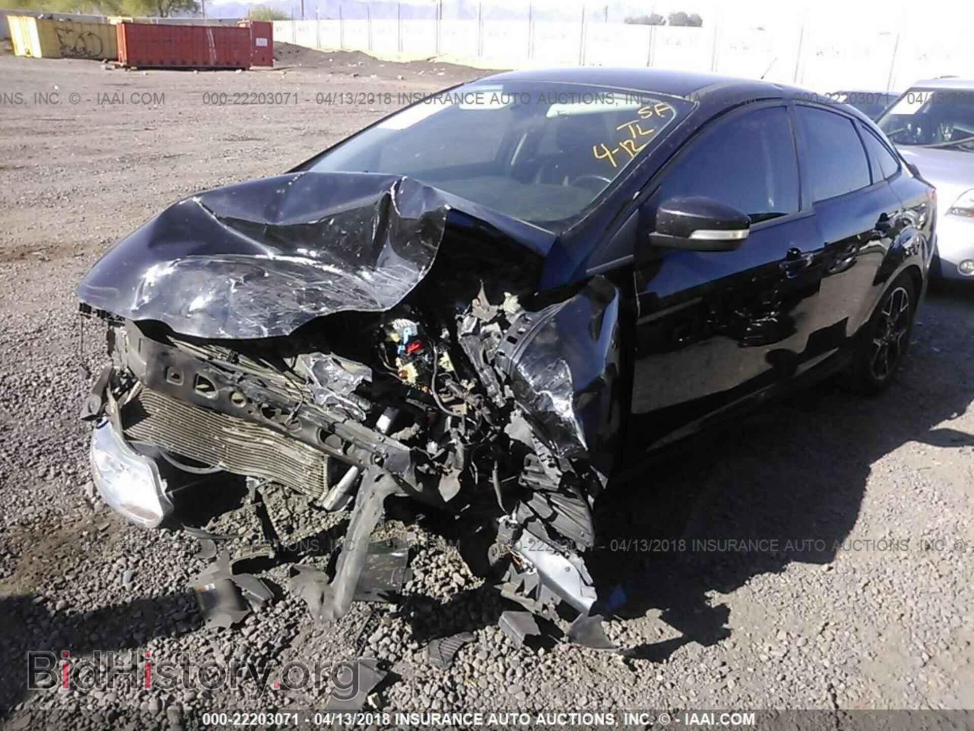 2014 Ford Focus - VIN: 1FADP3F21EL132123 - Фото 2