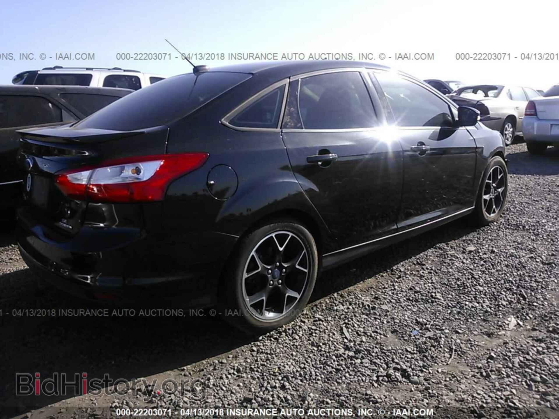 2014 Ford Focus - VIN: 1FADP3F21EL132123 - Фото 4
