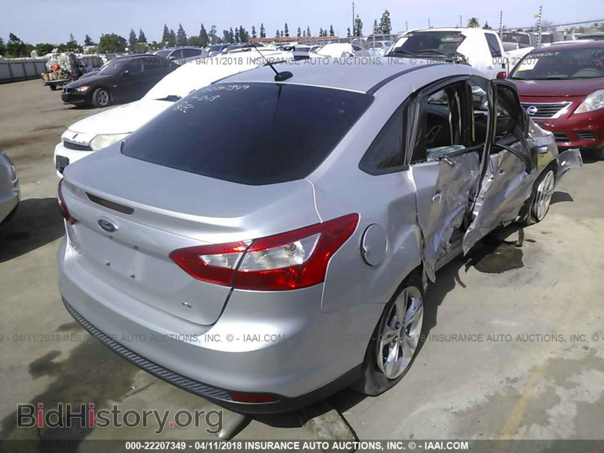 2014 Ford Focus - VIN: 1FADP3F24EL281948 - Photo 4