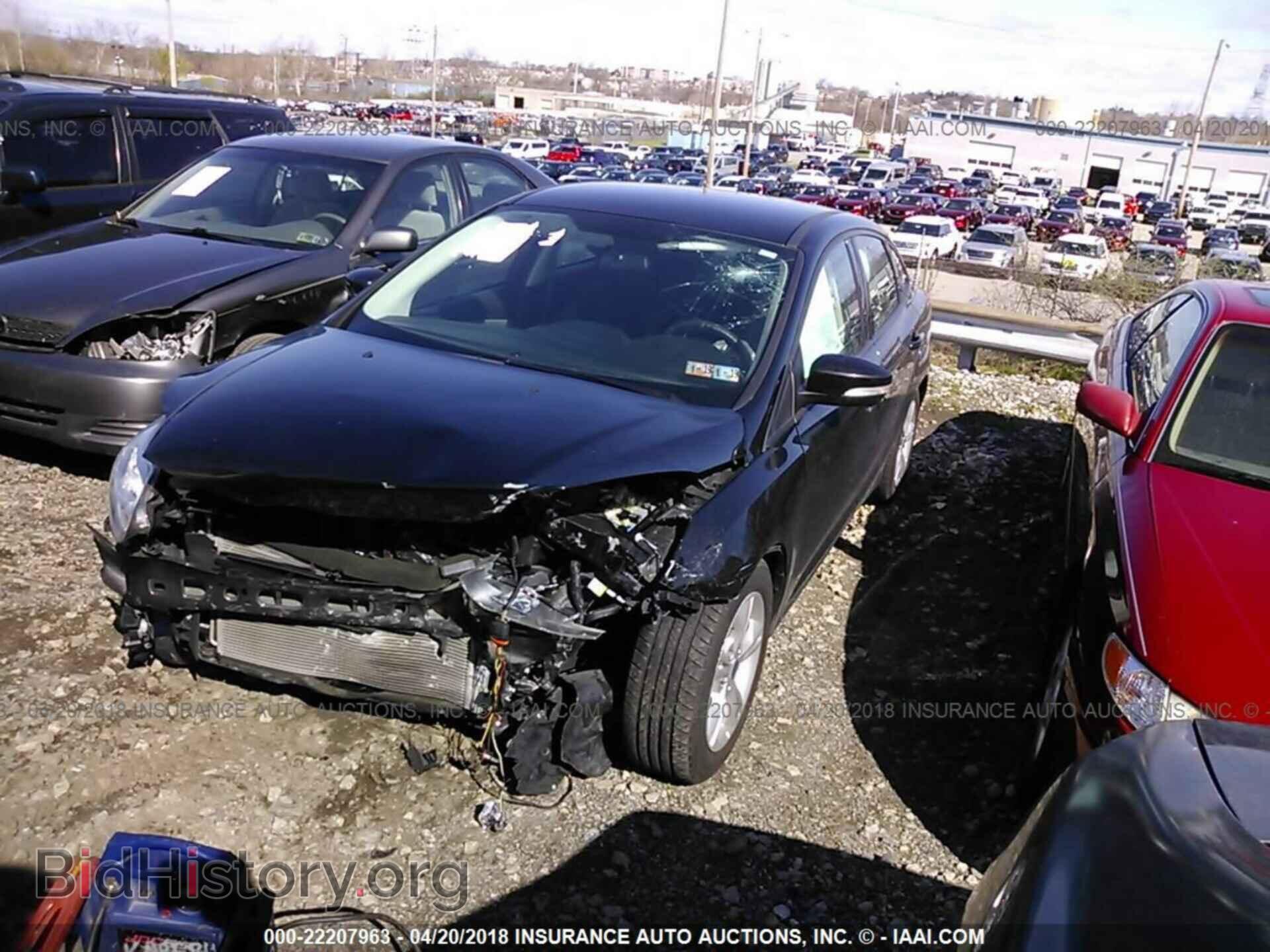 2014 Ford Focus - VIN: 1FADP3F24EL324703 - Фото 2