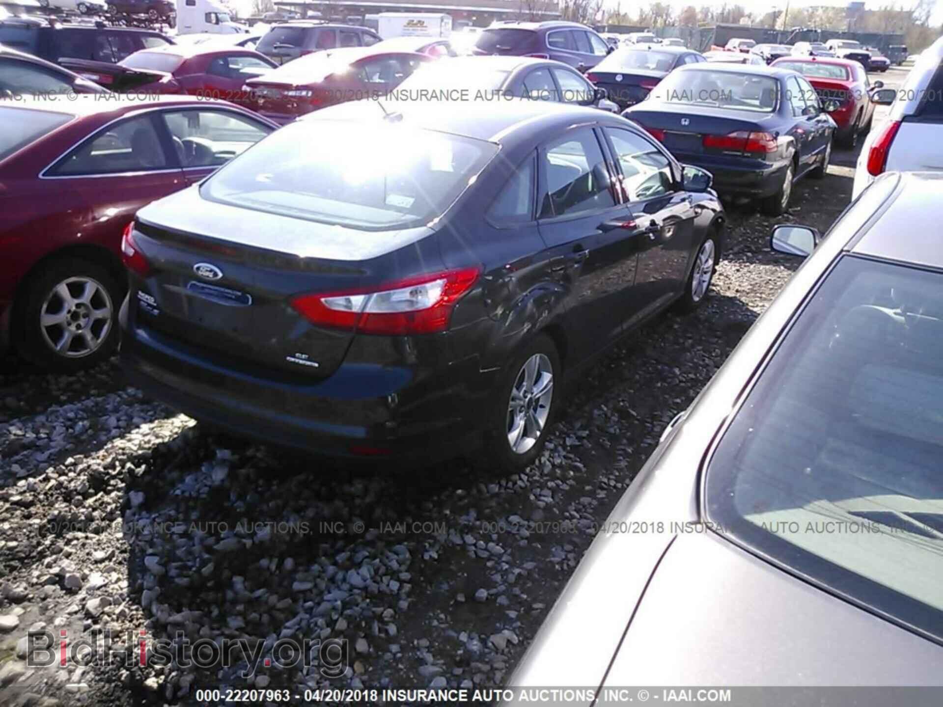 2014 Ford Focus - VIN: 1FADP3F24EL324703 - Фото 4