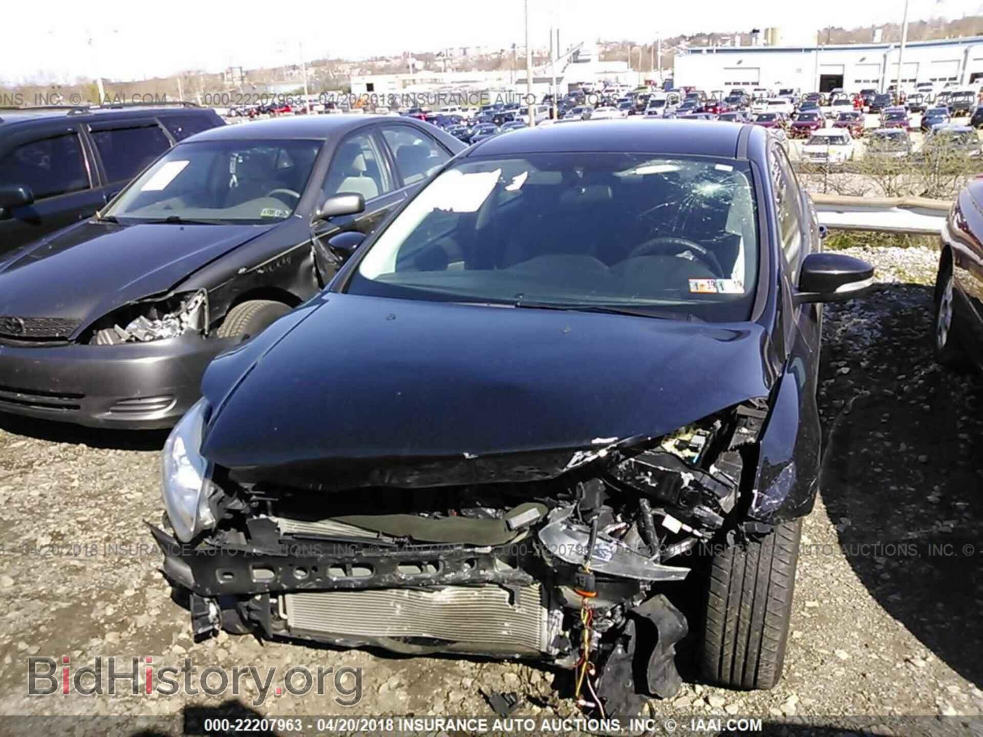 2014 Ford Focus - VIN: 1FADP3F24EL324703 - Фото 6