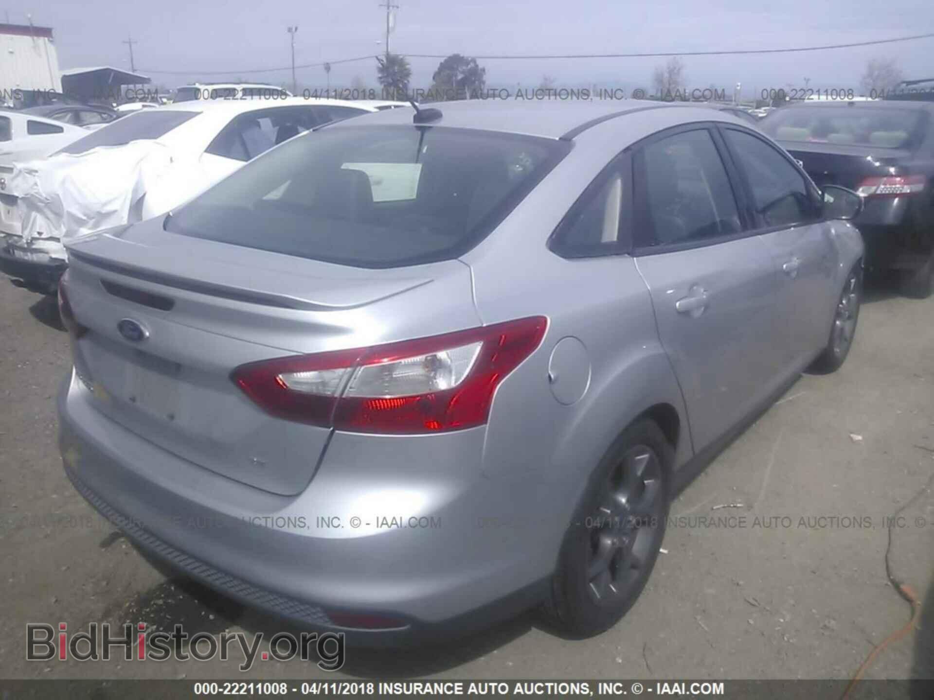 2014 Ford Focus - VIN: 1FADP3F23EL132270 - Photo 4