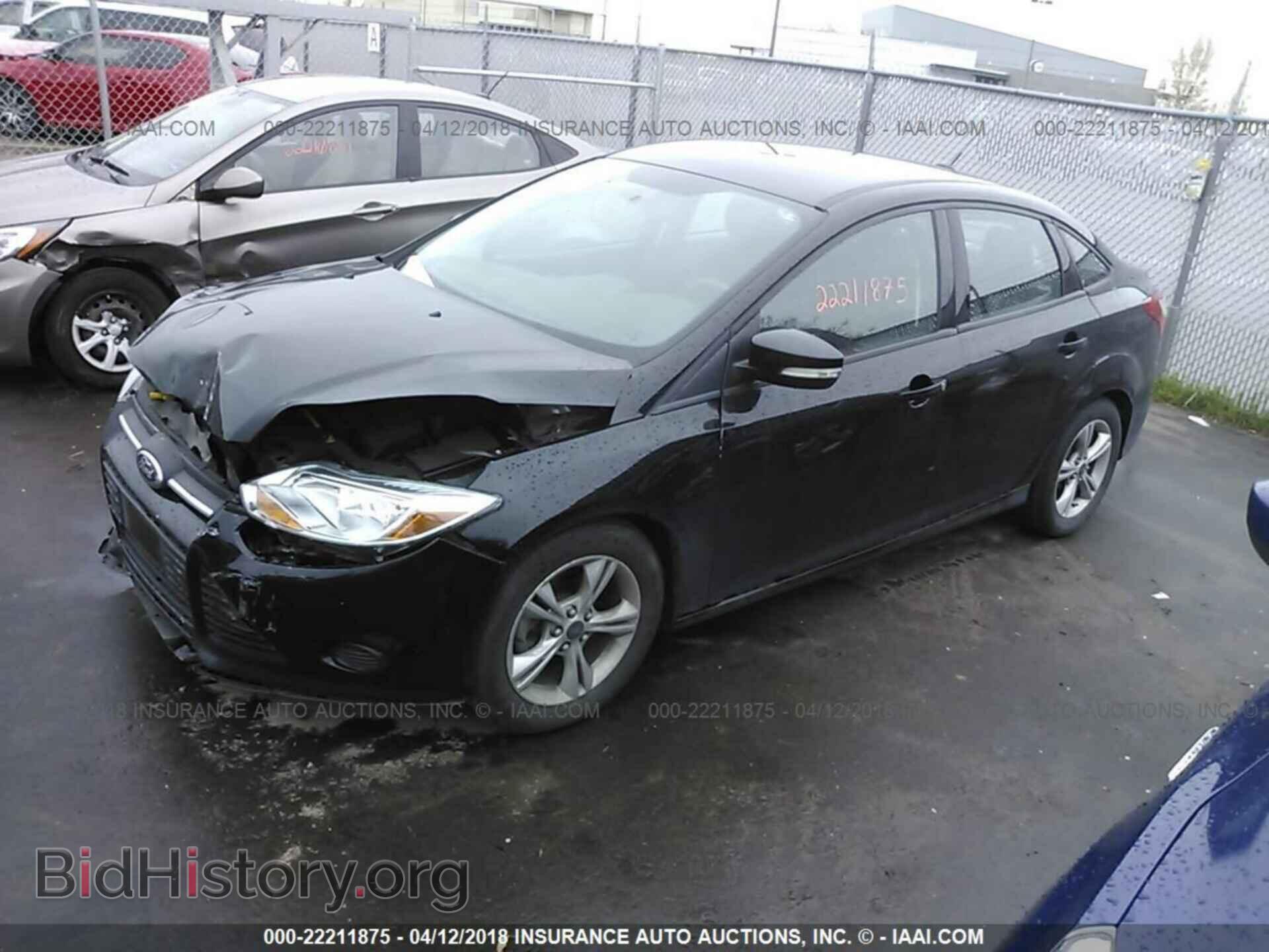 2014 Ford Focus - VIN: 1FADP3F29EL312319 - Фото 2