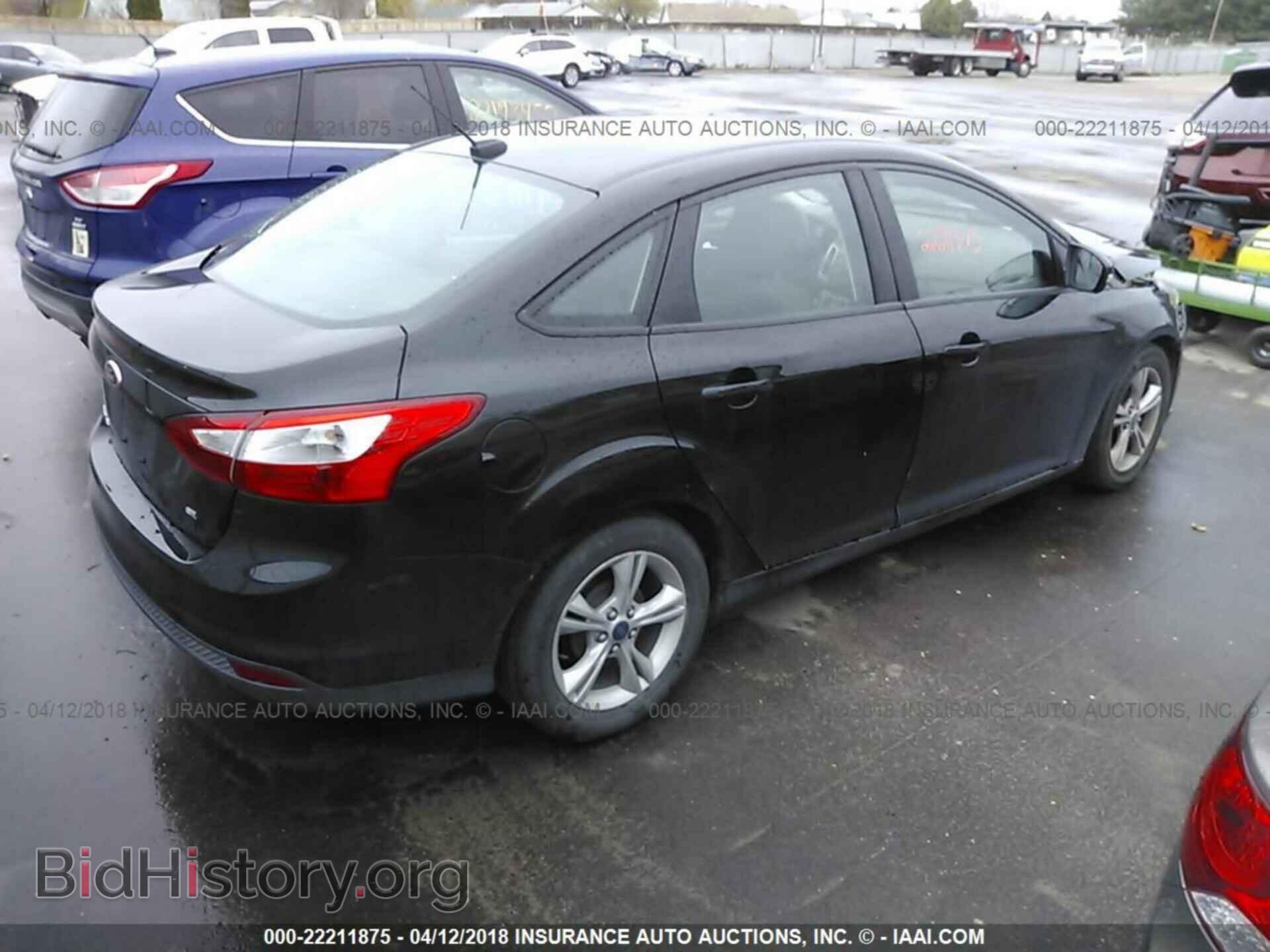 2014 Ford Focus - VIN: 1FADP3F29EL312319 - Фото 4