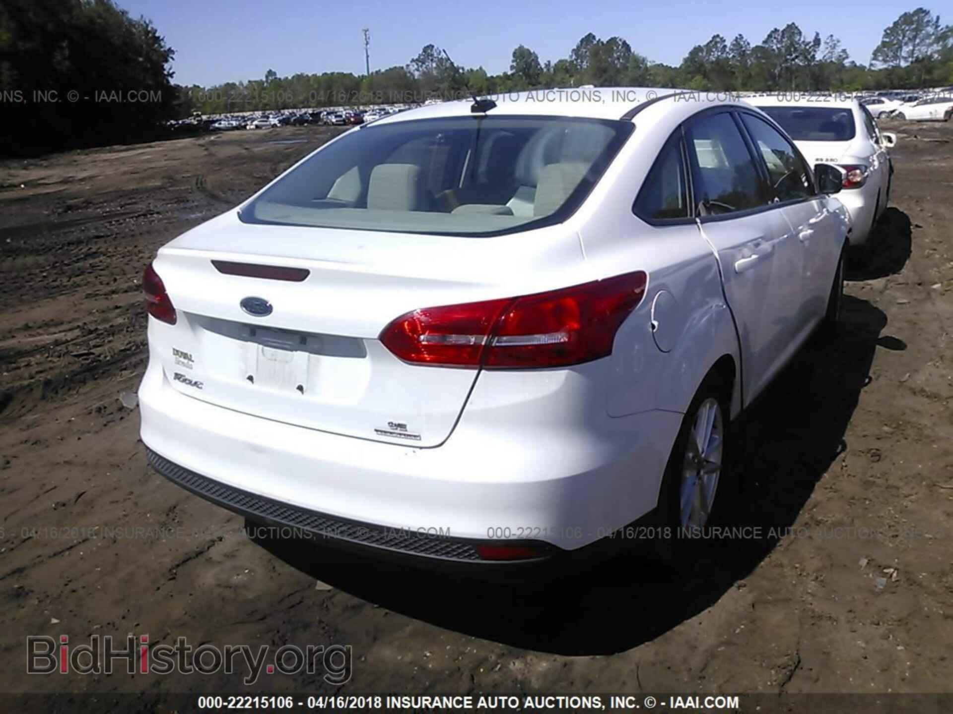 2015 Ford Focus - VIN: 1FADP3F20FL262671 - Photo 4