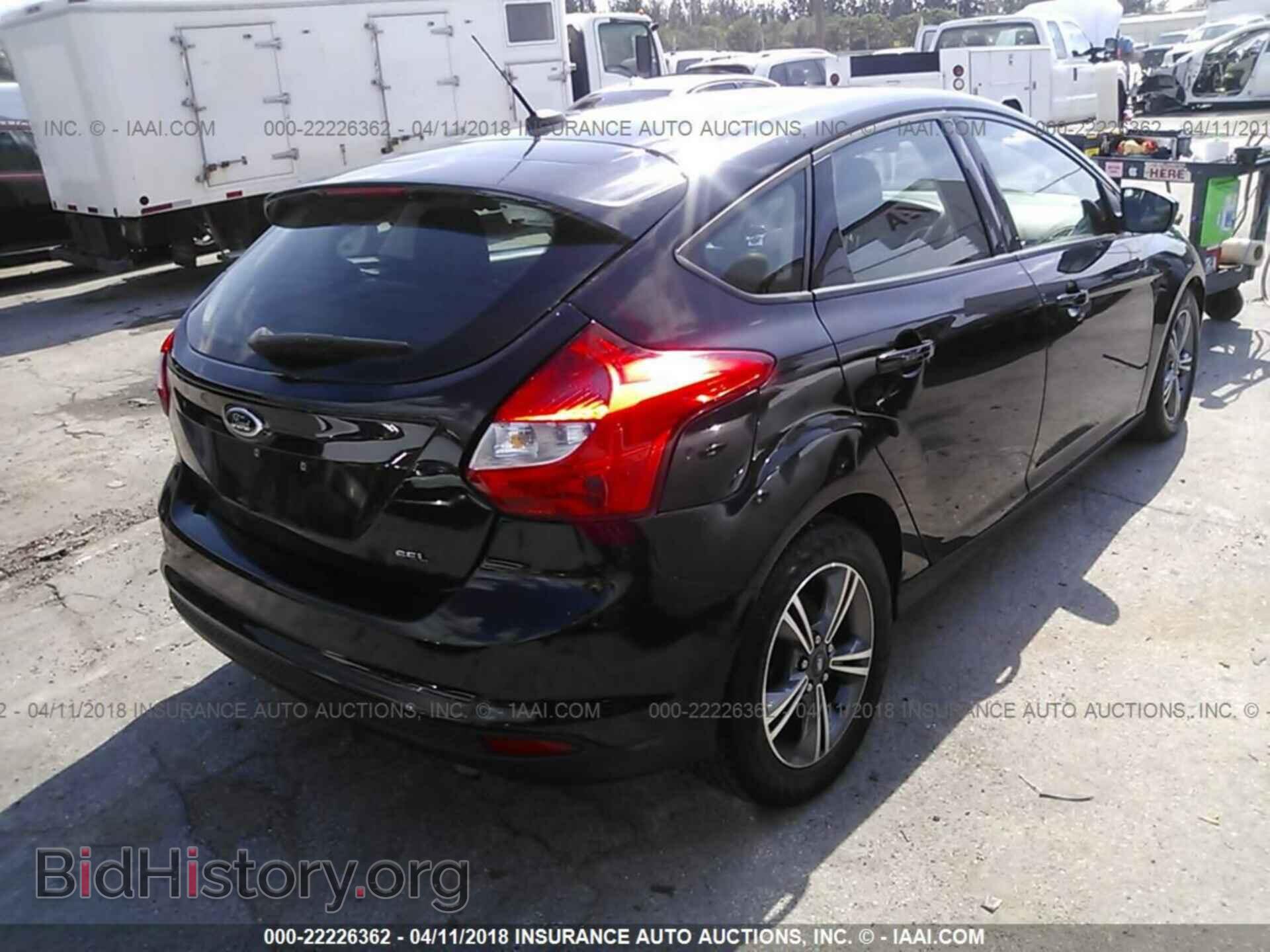 2014 Ford Focus - VIN: 1FADP3K21EL291939 - Photo 4