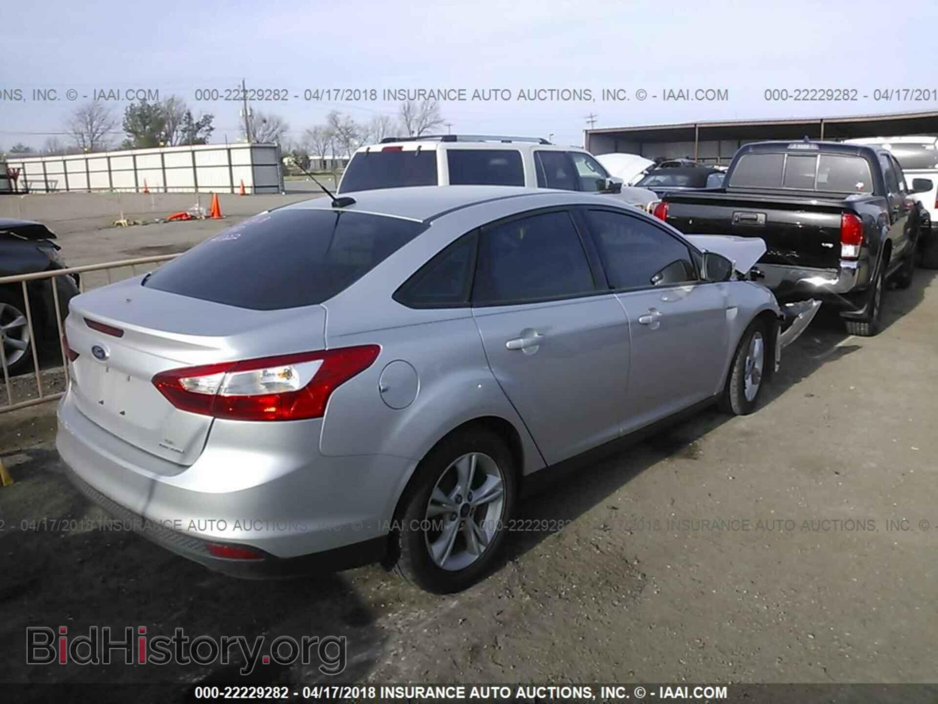 2014 Ford Focus - VIN: 1FADP3F26EL441022 - Фото 4