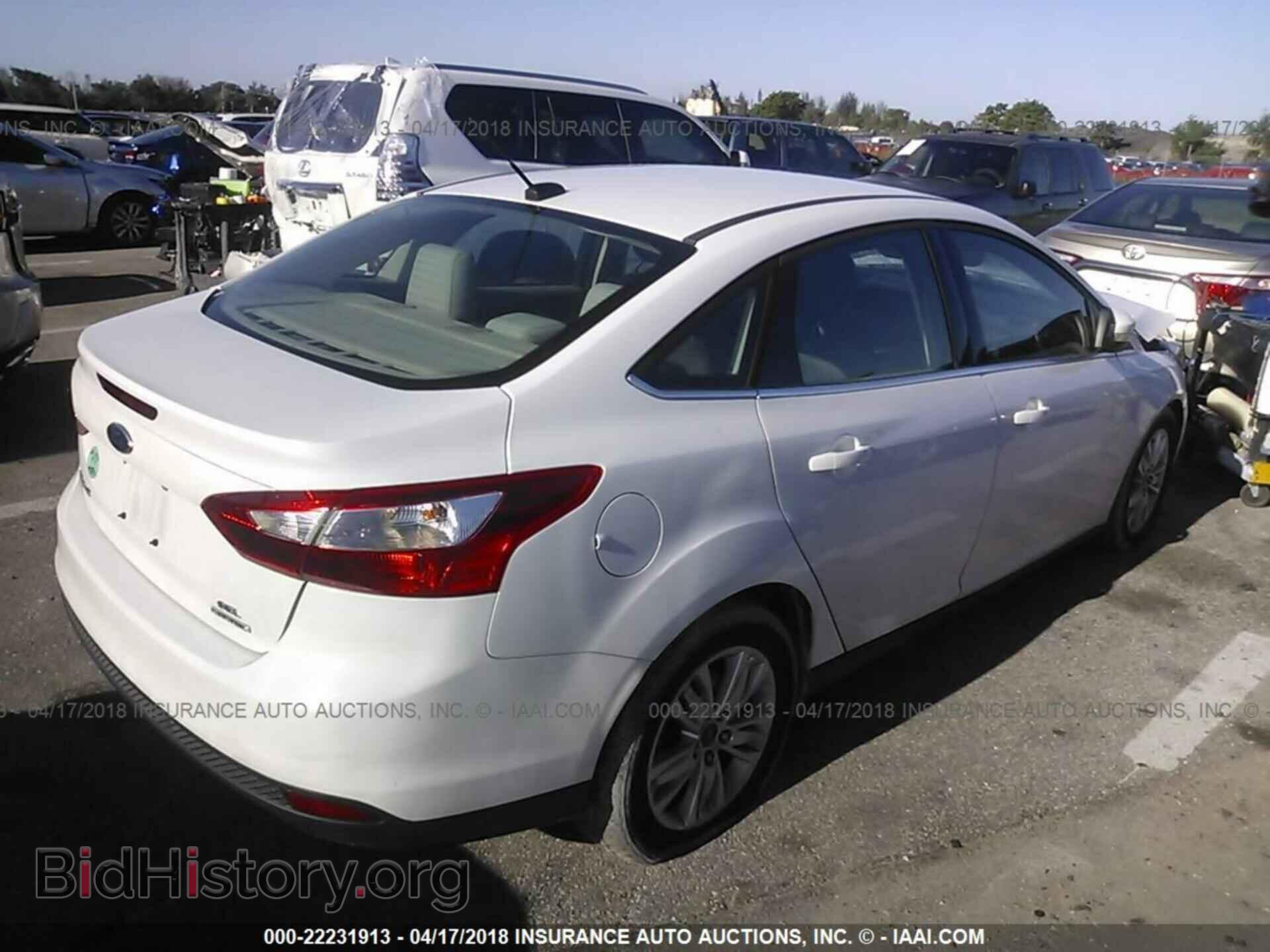 2012 Ford Focus - VIN: 1FAHP3H21CL375717 - Photo 4