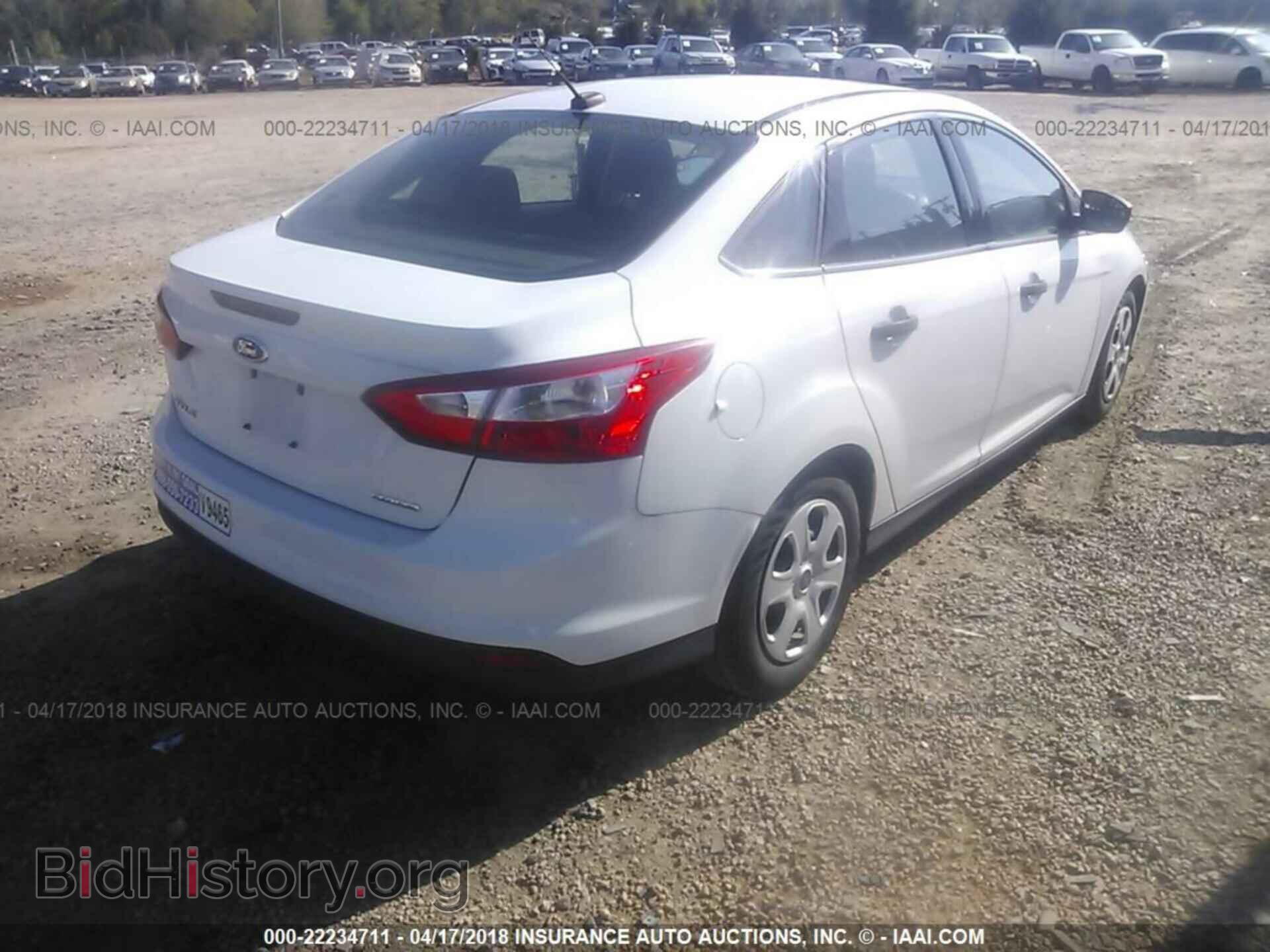 2014 Ford Focus - VIN: 1FADP3E29EL323256 - Фото 4