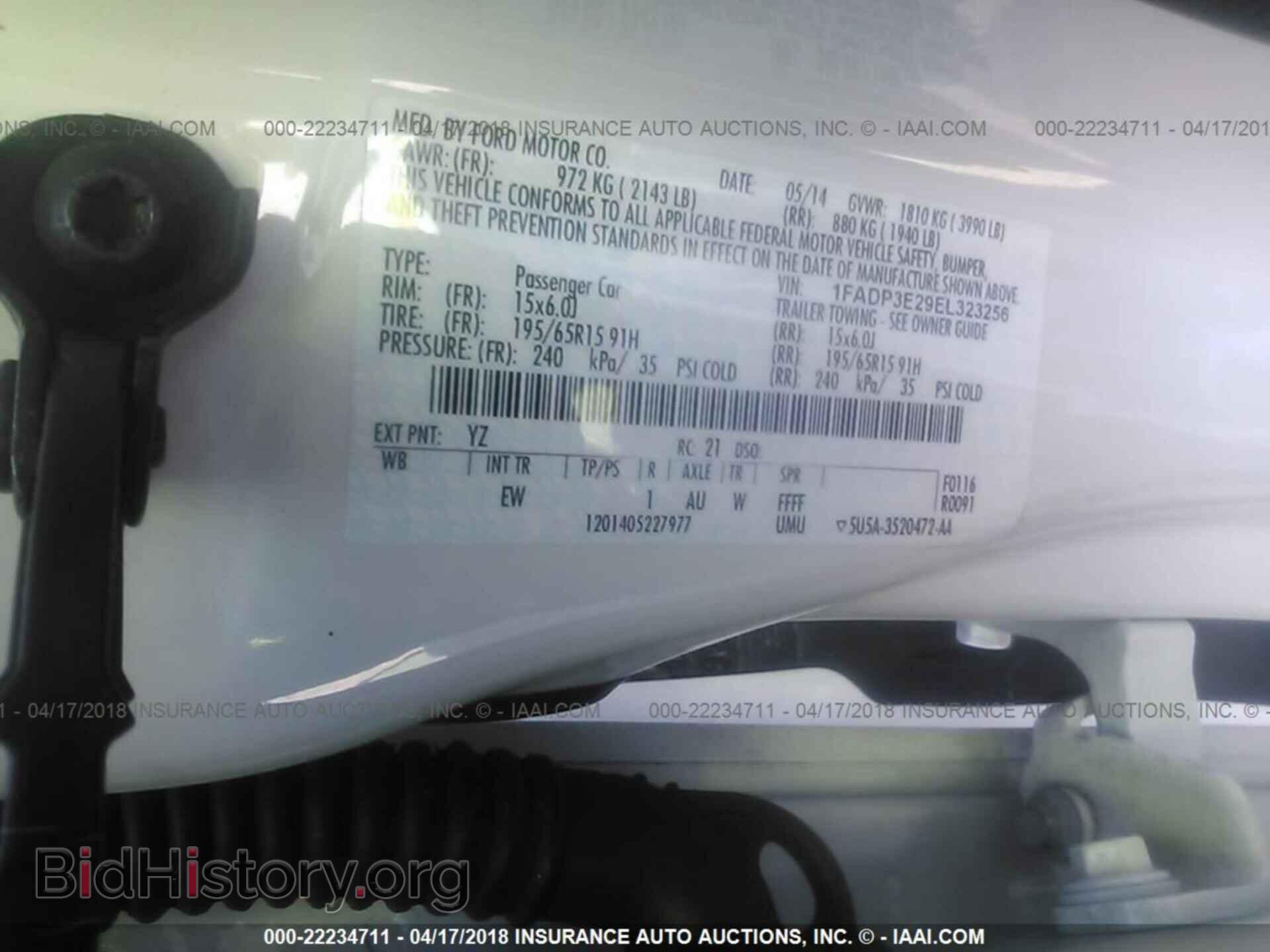 2014 Ford Focus - VIN: 1FADP3E29EL323256 - Фото 9