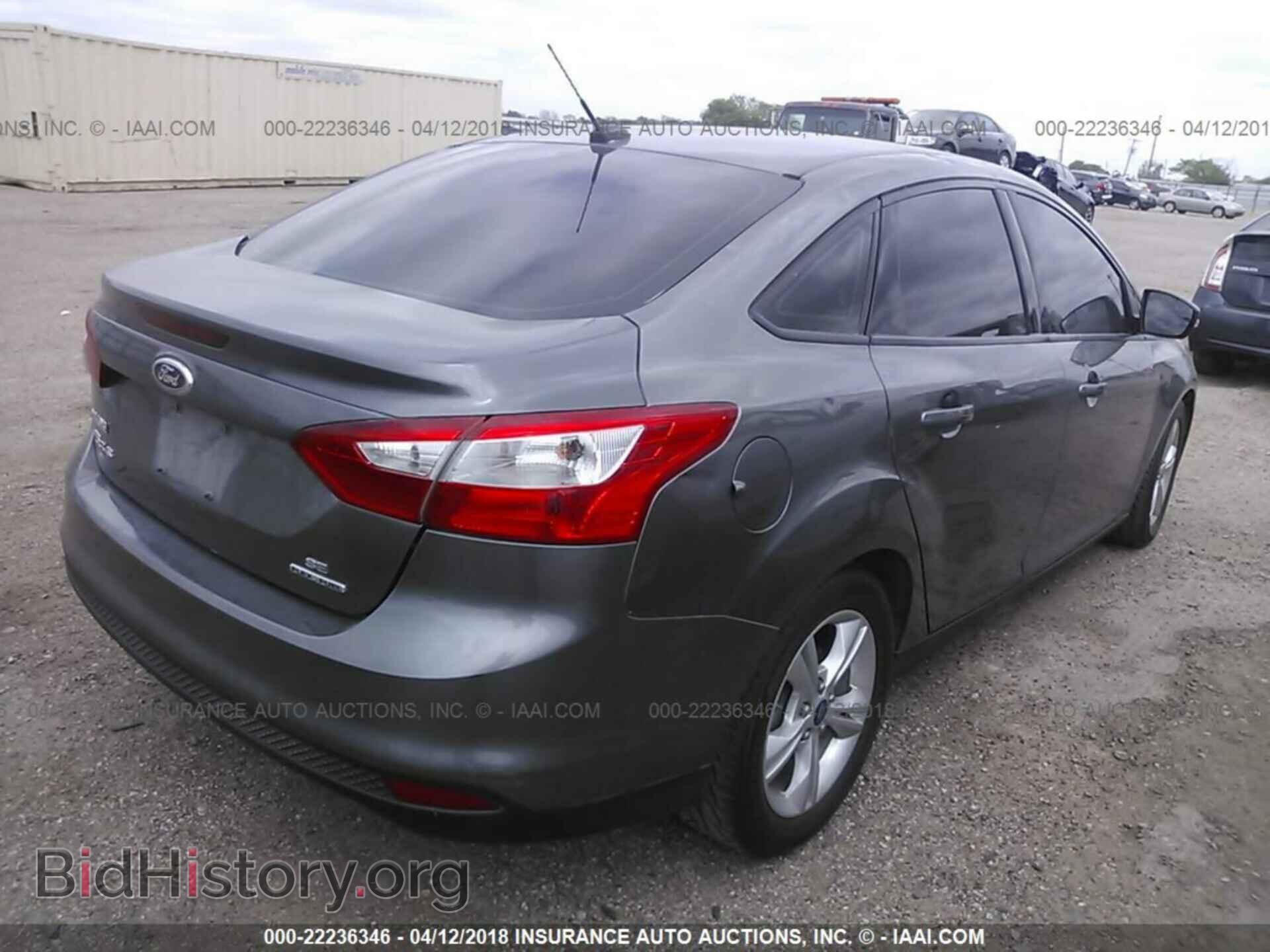 2014 Ford Focus - VIN: 1FADP3F29EL229800 - Фото 4