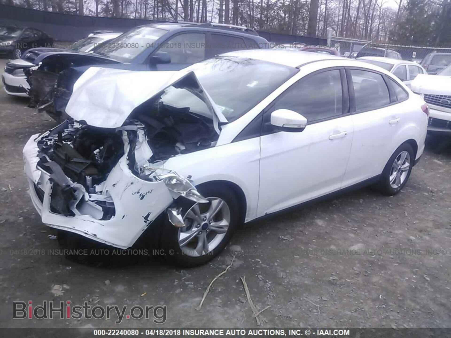 2014 Ford Focus - VIN: 1FADP3F22EL358901 - Photo 2
