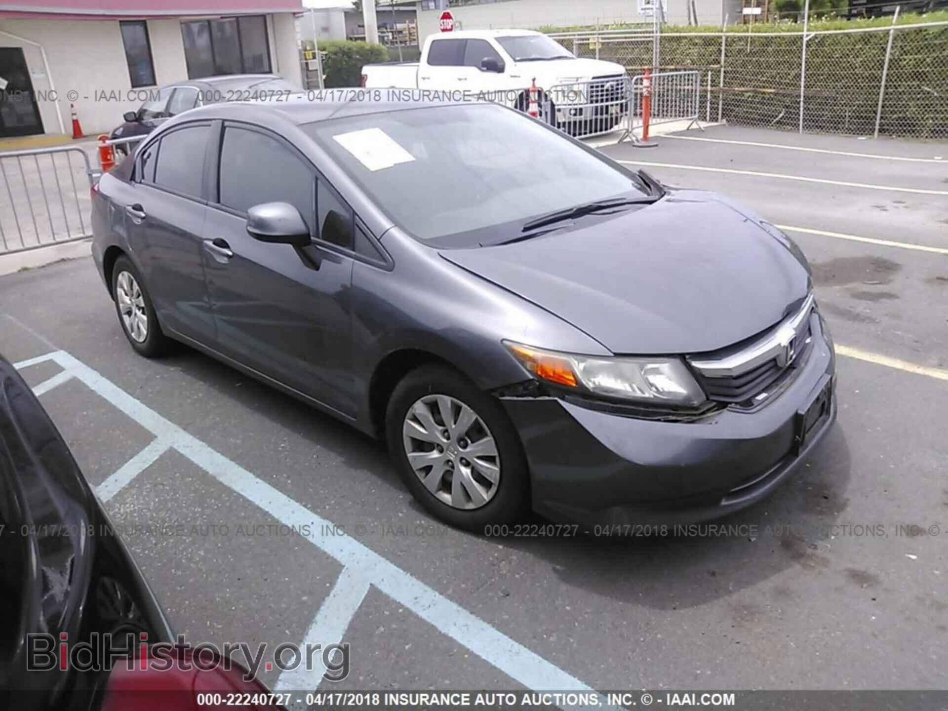2012 Honda CIVIC (VIN 2HGFB2F58CH332465) — фото 1 из 10, IAAI, повреждение: левая передняя часть