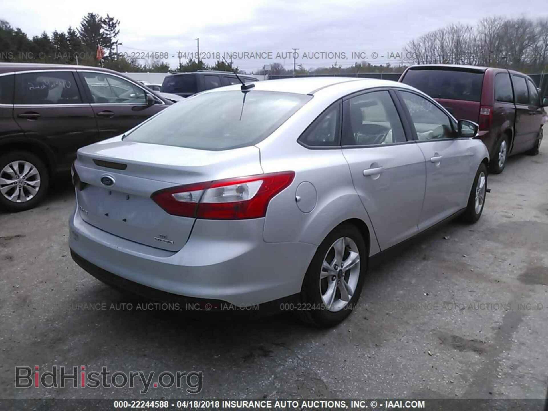 2014 Ford Focus - VIN: 1FADP3F23EL265109 - Фото 4