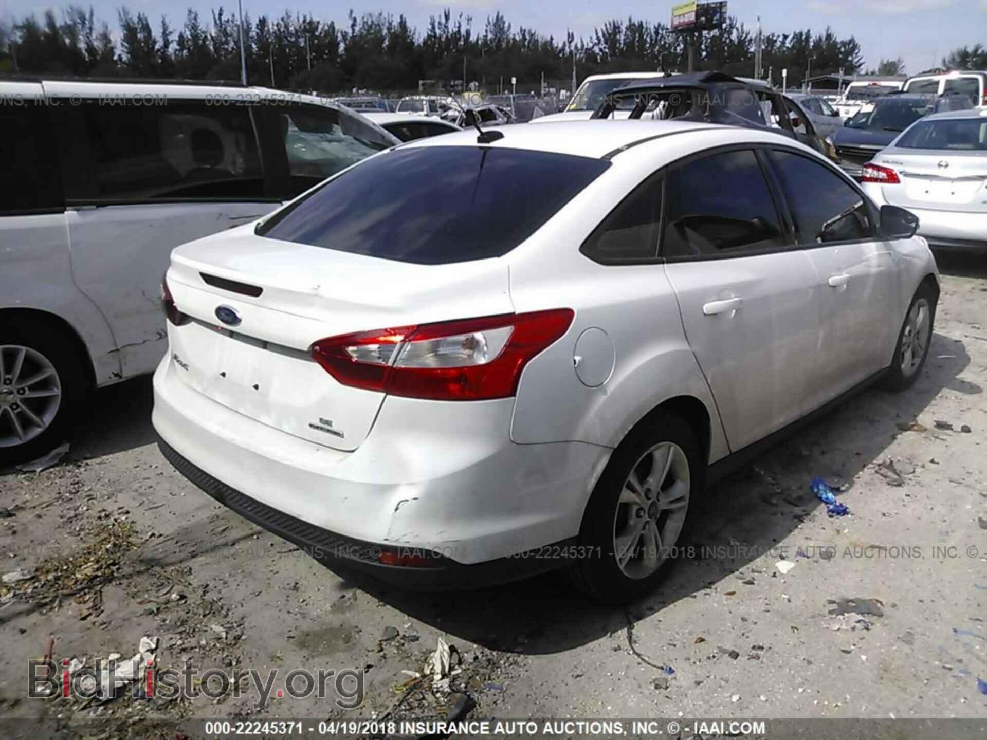 2014 Ford Focus - VIN: 1FADP3F21EL426377 - Фото 4