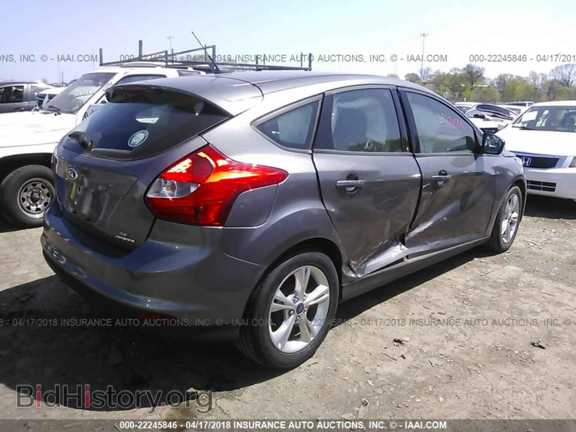 2014 Ford Focus - VIN: 1FADP3K25EL312873 - Photo 4