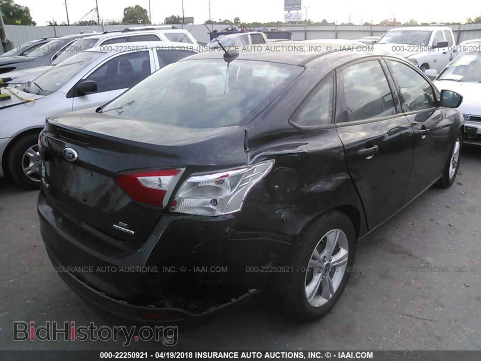 2014 Ford Focus - VIN: 1FADP3F28EL399159 - Photo 4
