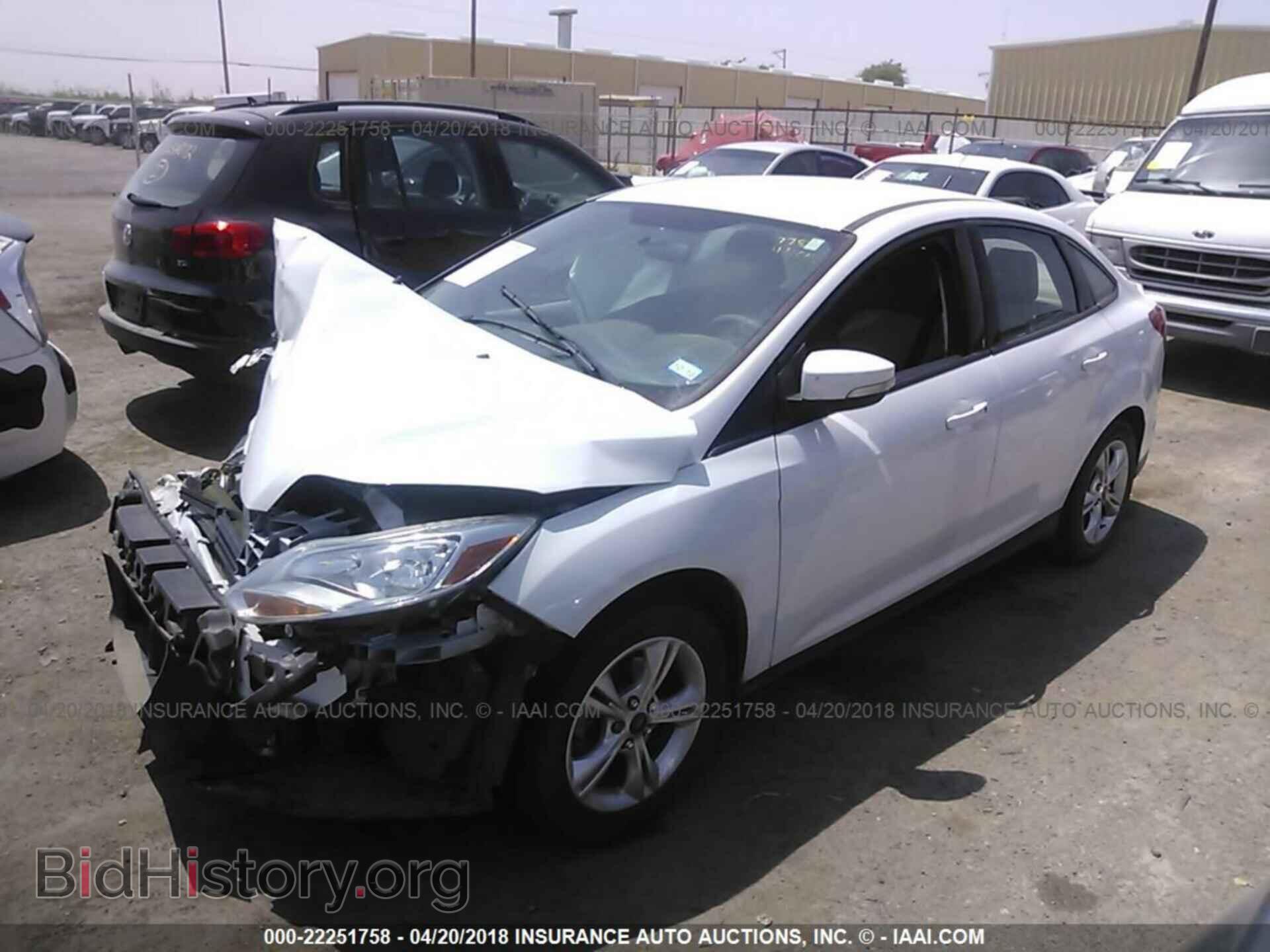 2014 Ford Focus - VIN: 1FADP3F20EL325220 - Фото 2