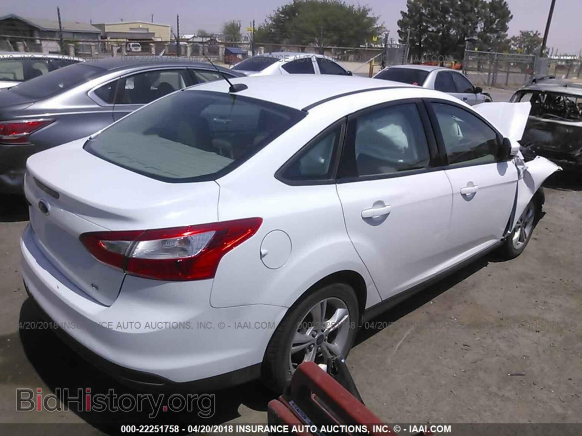 2014 Ford Focus - VIN: 1FADP3F20EL325220 - Фото 4