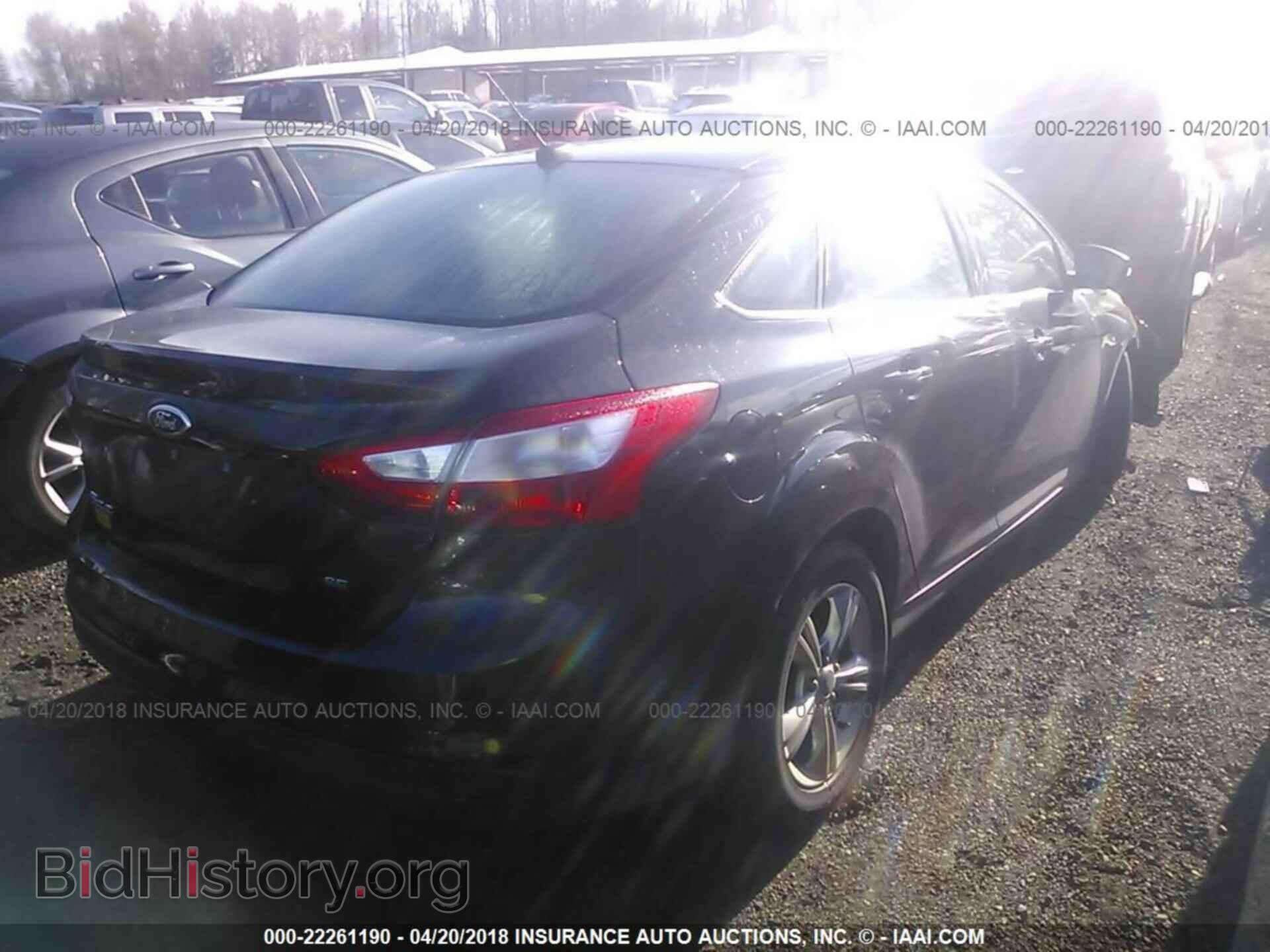2014 Ford Focus - VIN: 1FADP3F2XEL211449 - Photo 4