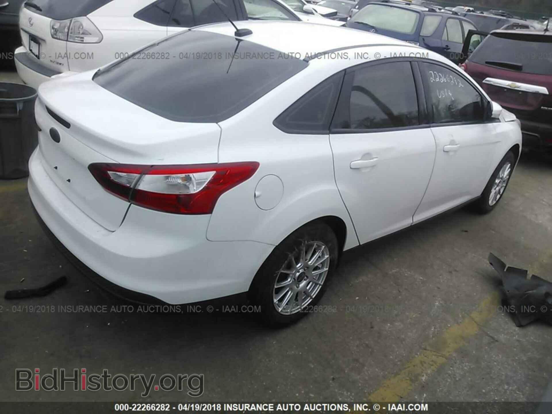 2013 Ford Focus - VIN: 1FADP3F23DL247319 - Photo 4