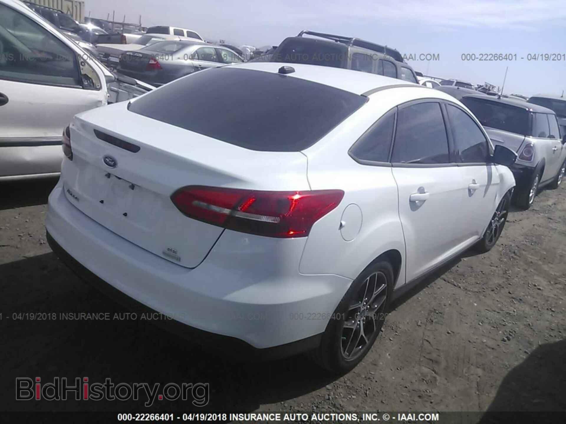 2017 Ford Focus - VIN: 1FADP3FE1HL314743 - Photo 4