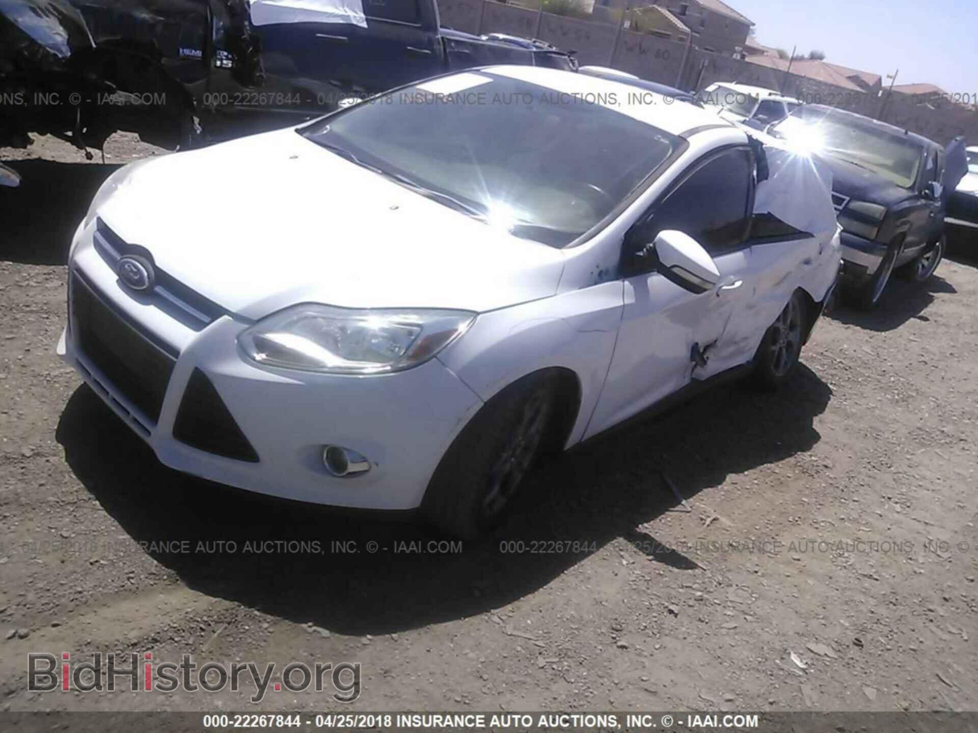 2014 Ford Focus - VIN: 1FADP3F29EL109219 - Photo 2