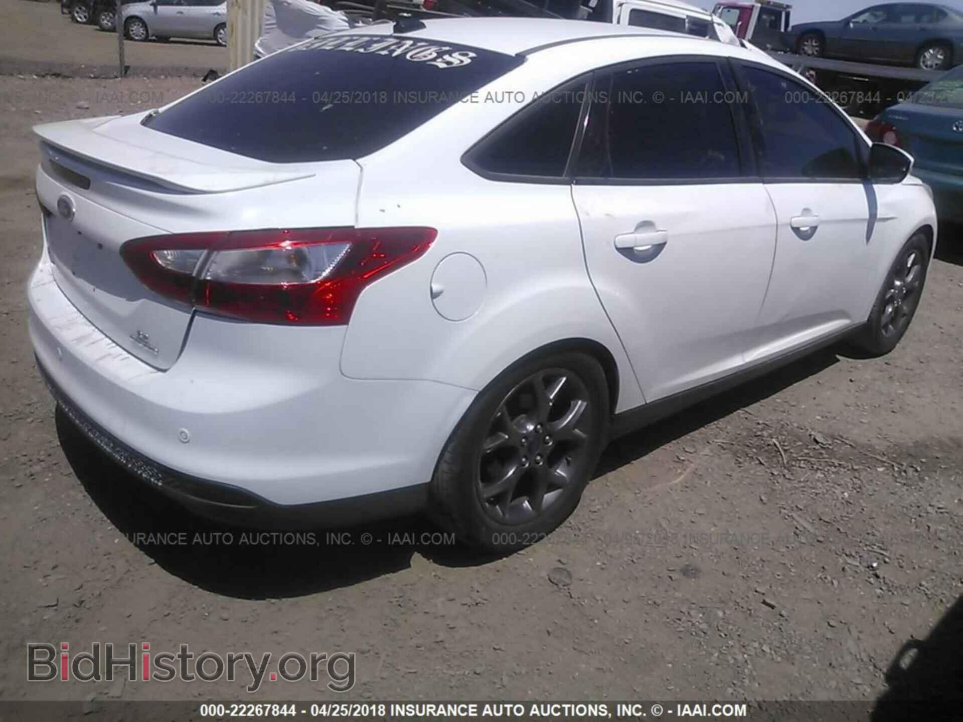 2014 Ford Focus - VIN: 1FADP3F29EL109219 - Photo 4