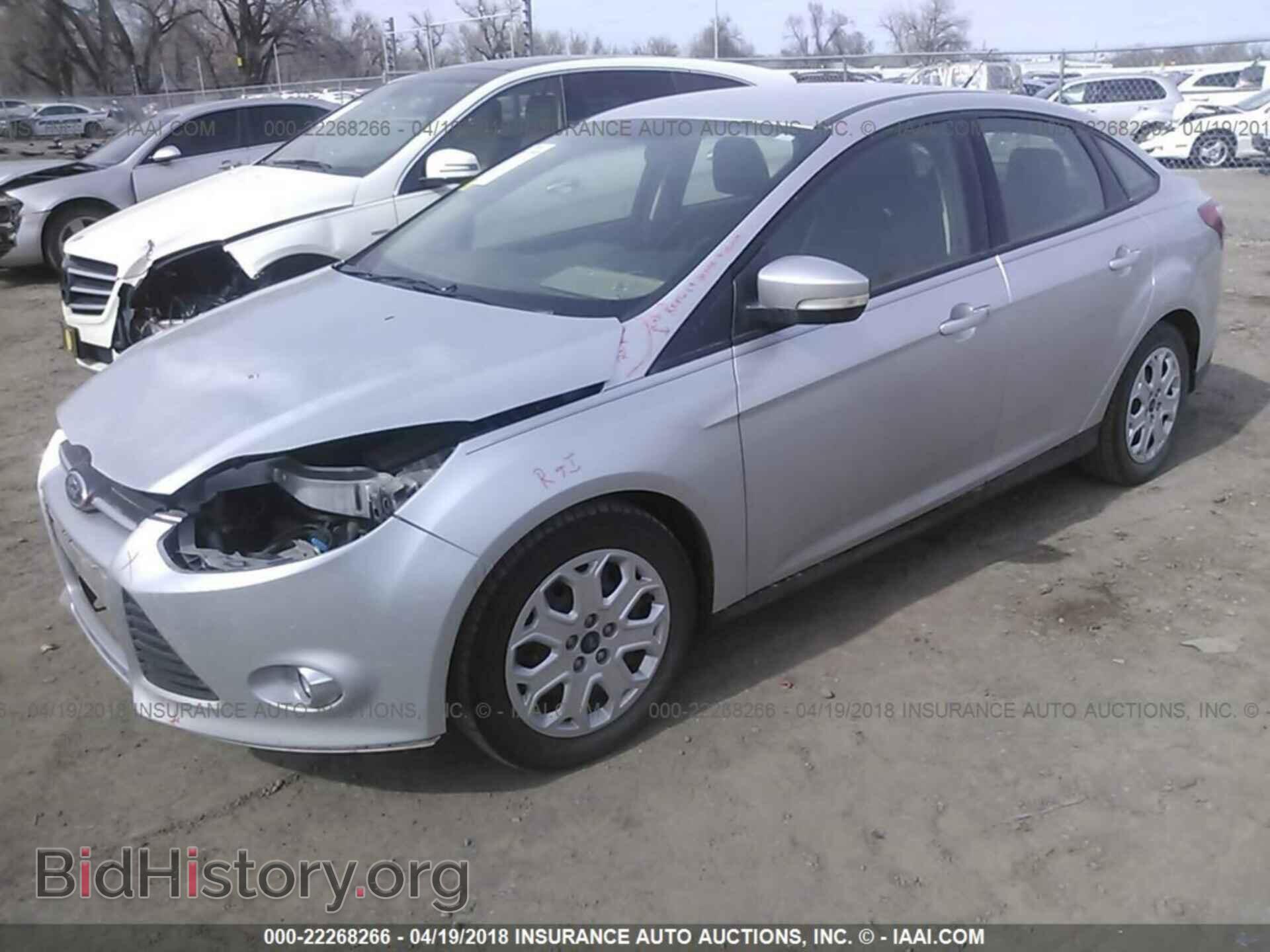 2012 Ford Focus - VIN: 1FAHP3F27CL314827 - Фото 2