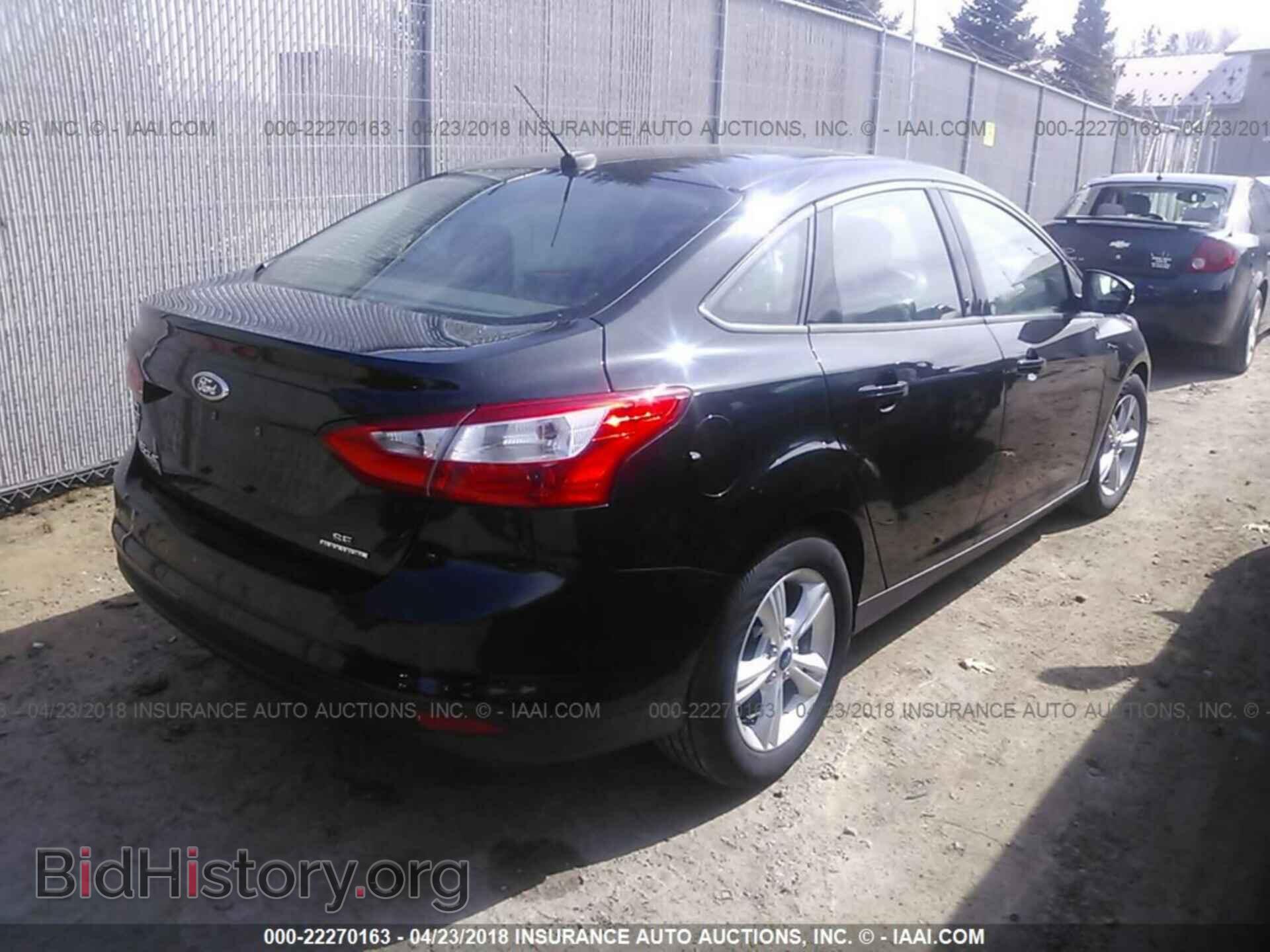 2014 Ford Focus - VIN: 1FADP3F25EL427886 - Фото 4
