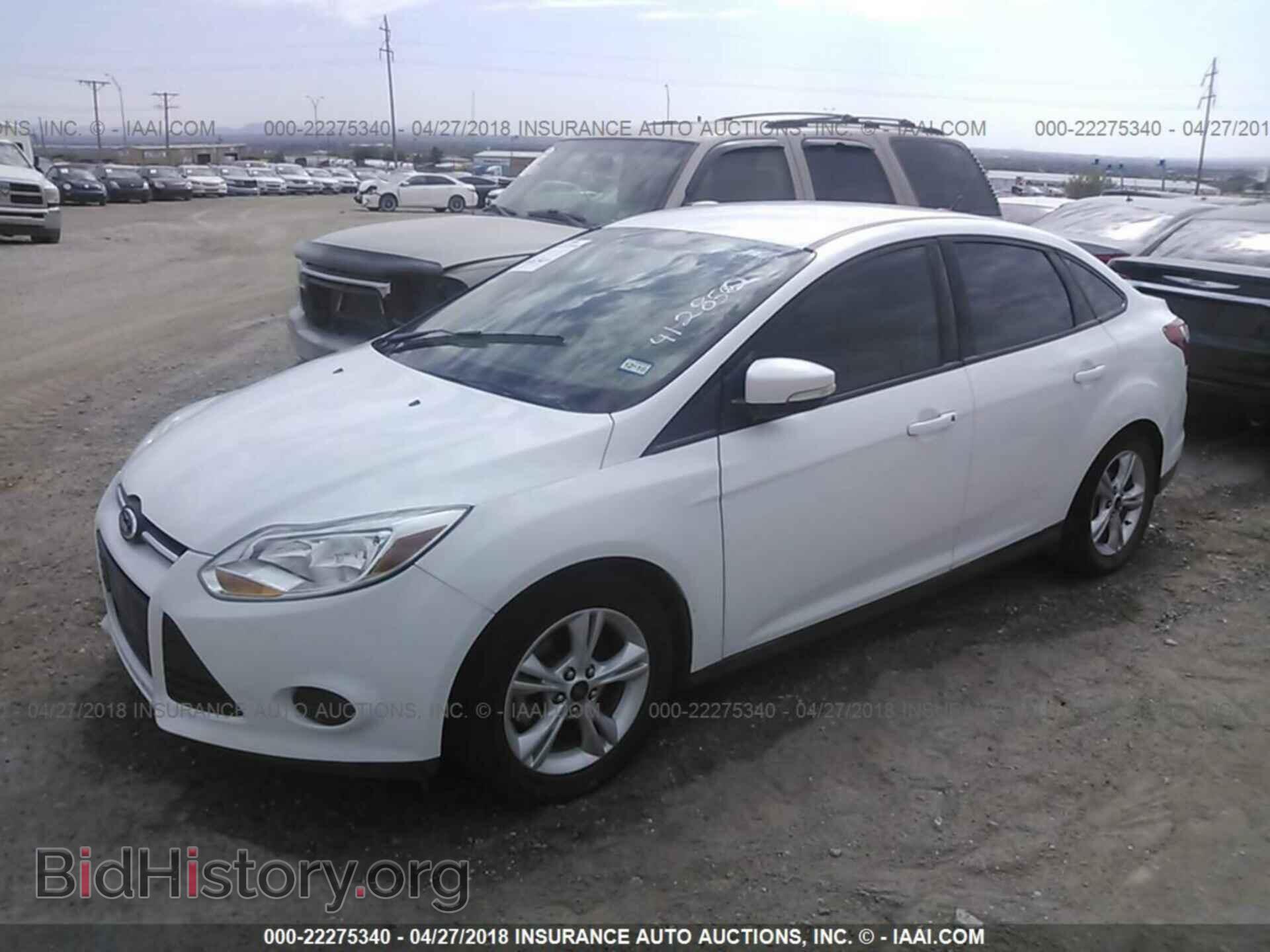 2014 Ford Focus - VIN: 1FADP3F21EL412852 - Photo 2