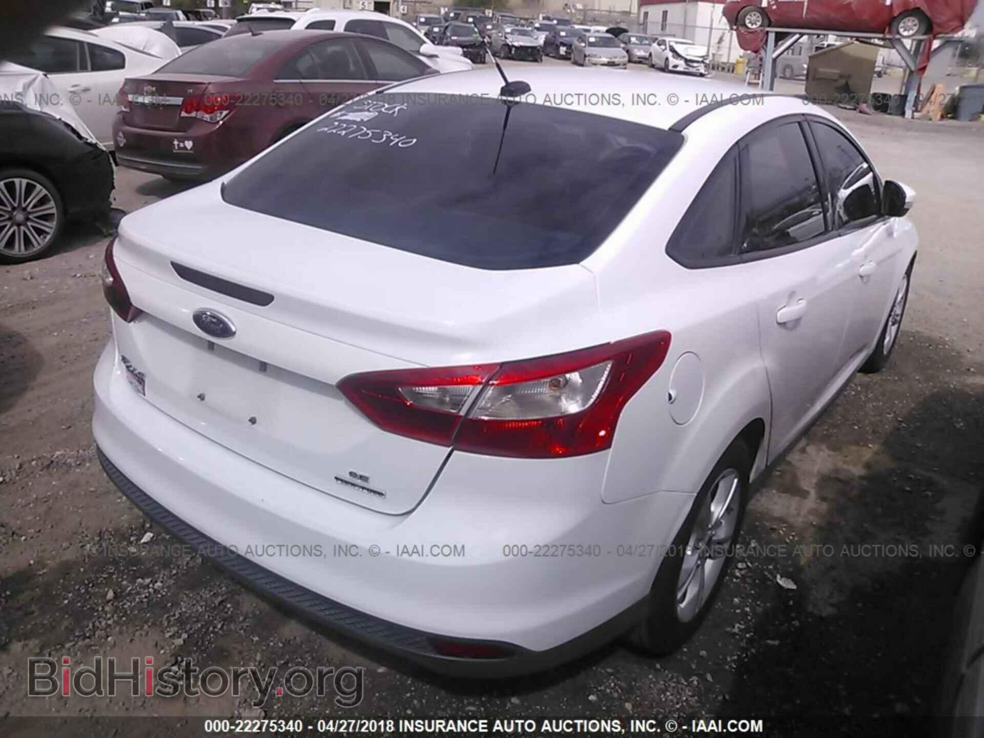 2014 Ford Focus - VIN: 1FADP3F21EL412852 - Photo 4