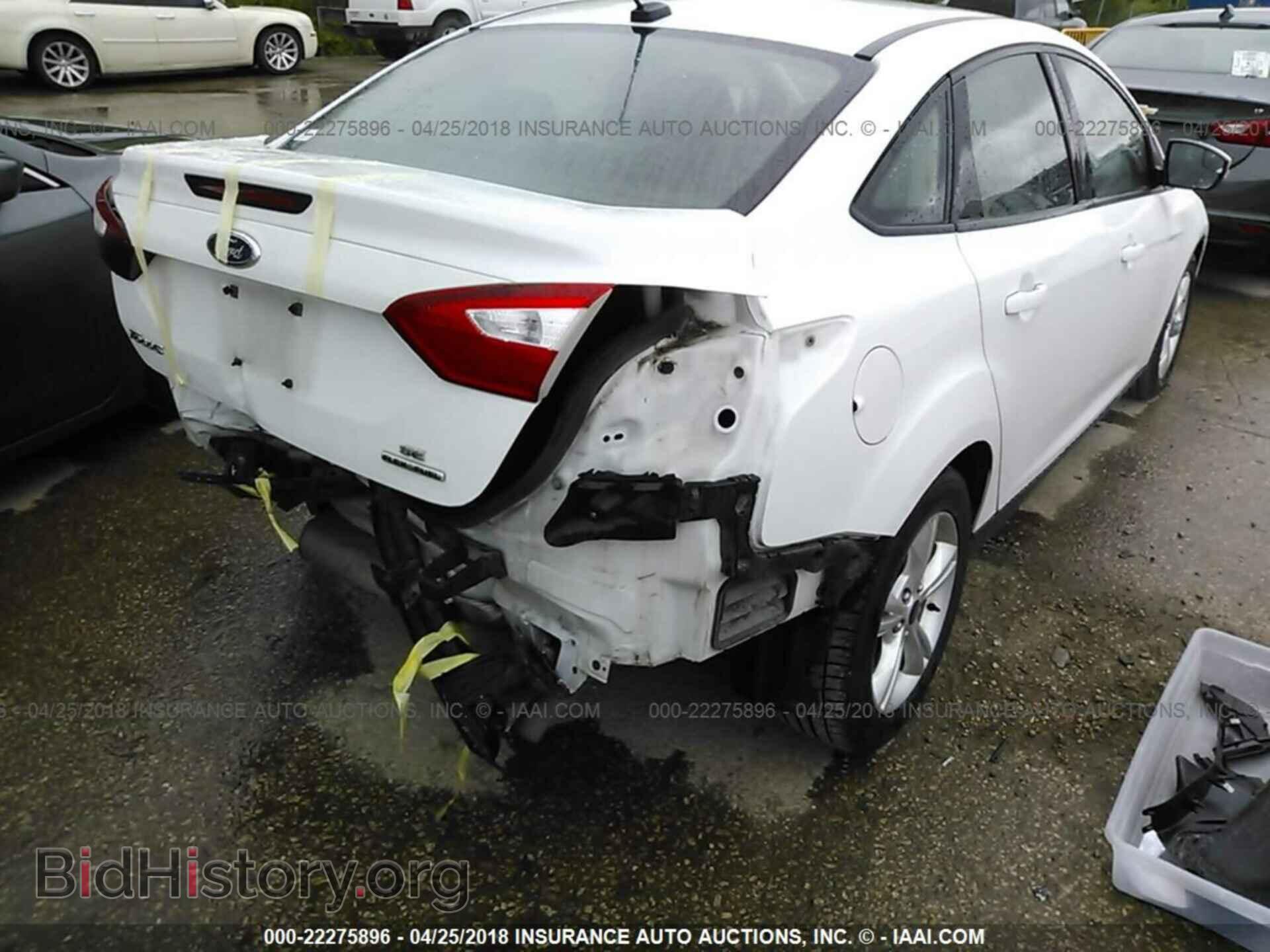 2013 Ford Focus - VIN: 1FADP3F21DL302866 - Фото 4